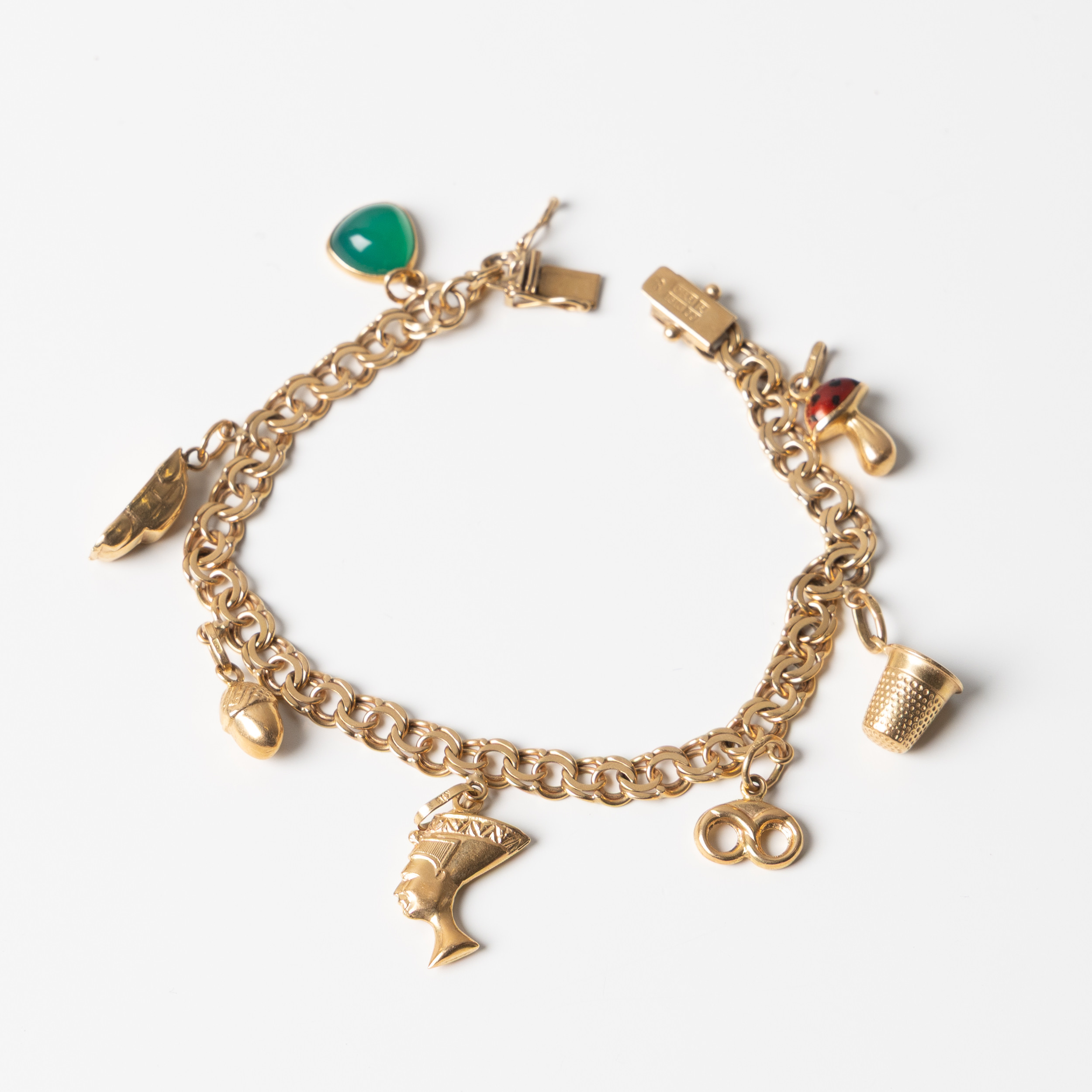BERLOCKARMBAND, 18K guld.