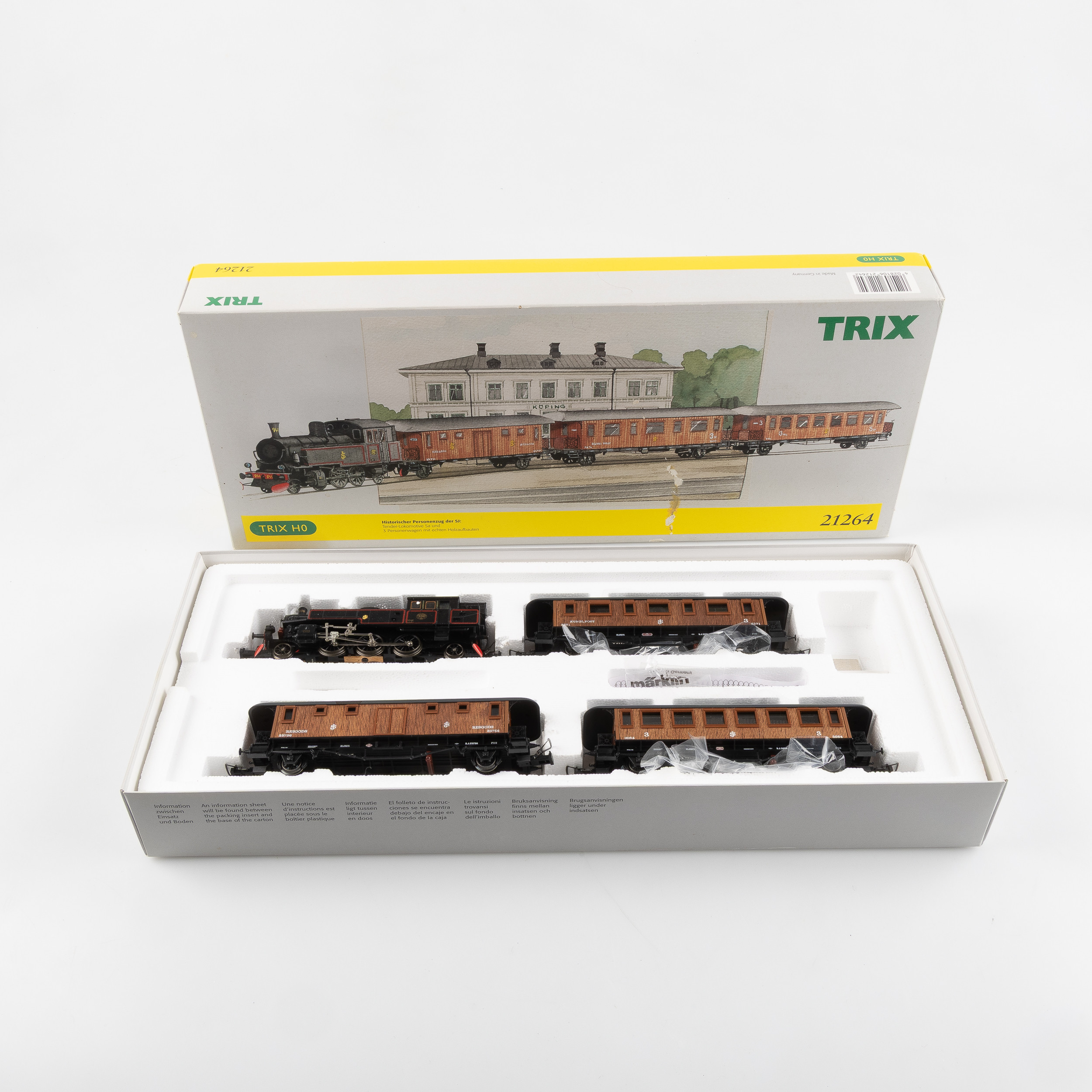 TRIX, modelljärnvägsdelar, 4 st, SJ:s ånglok 938 med vagnar 3271, 25756 och 3054.