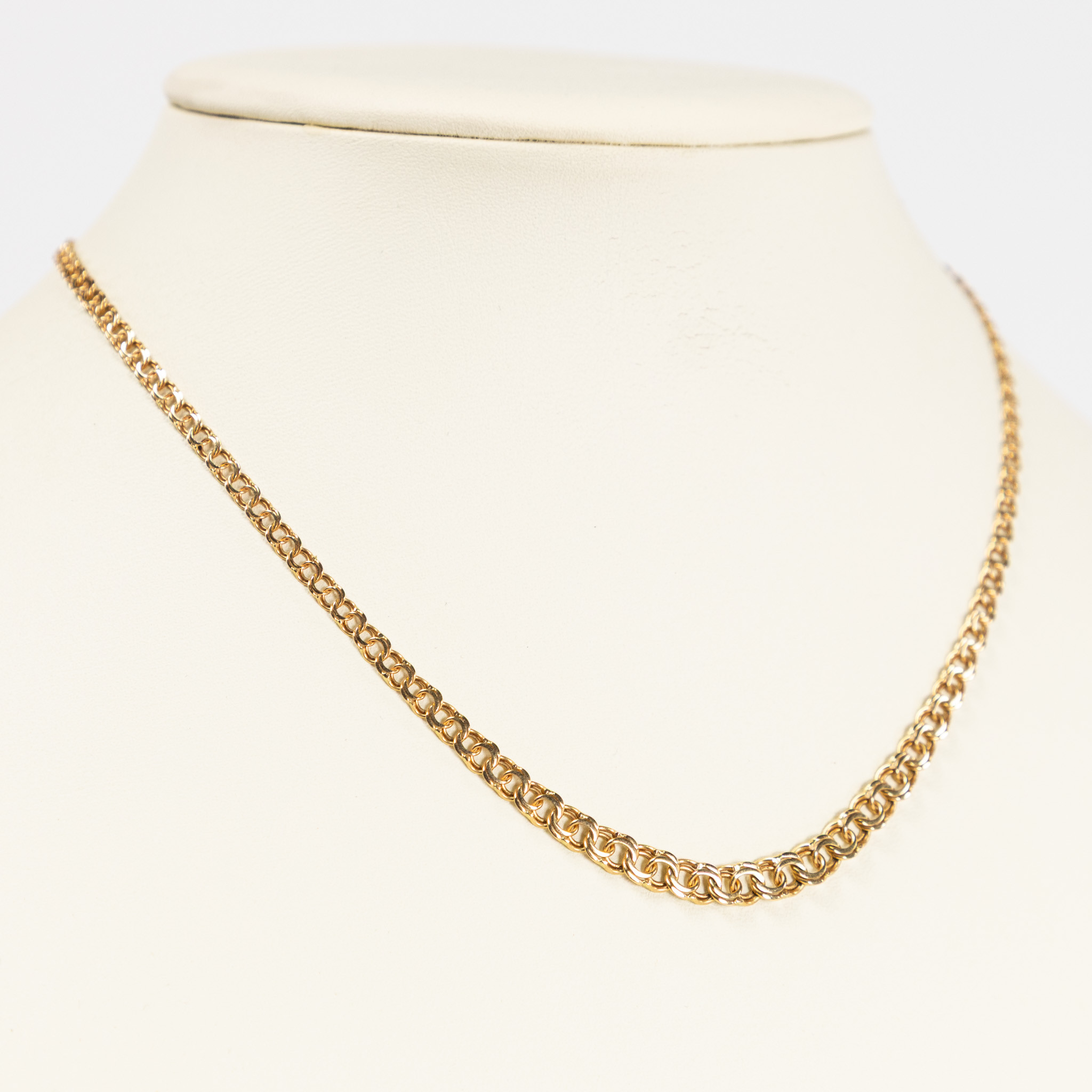 BISMARCKLÄNK. 18k guld, GHA.