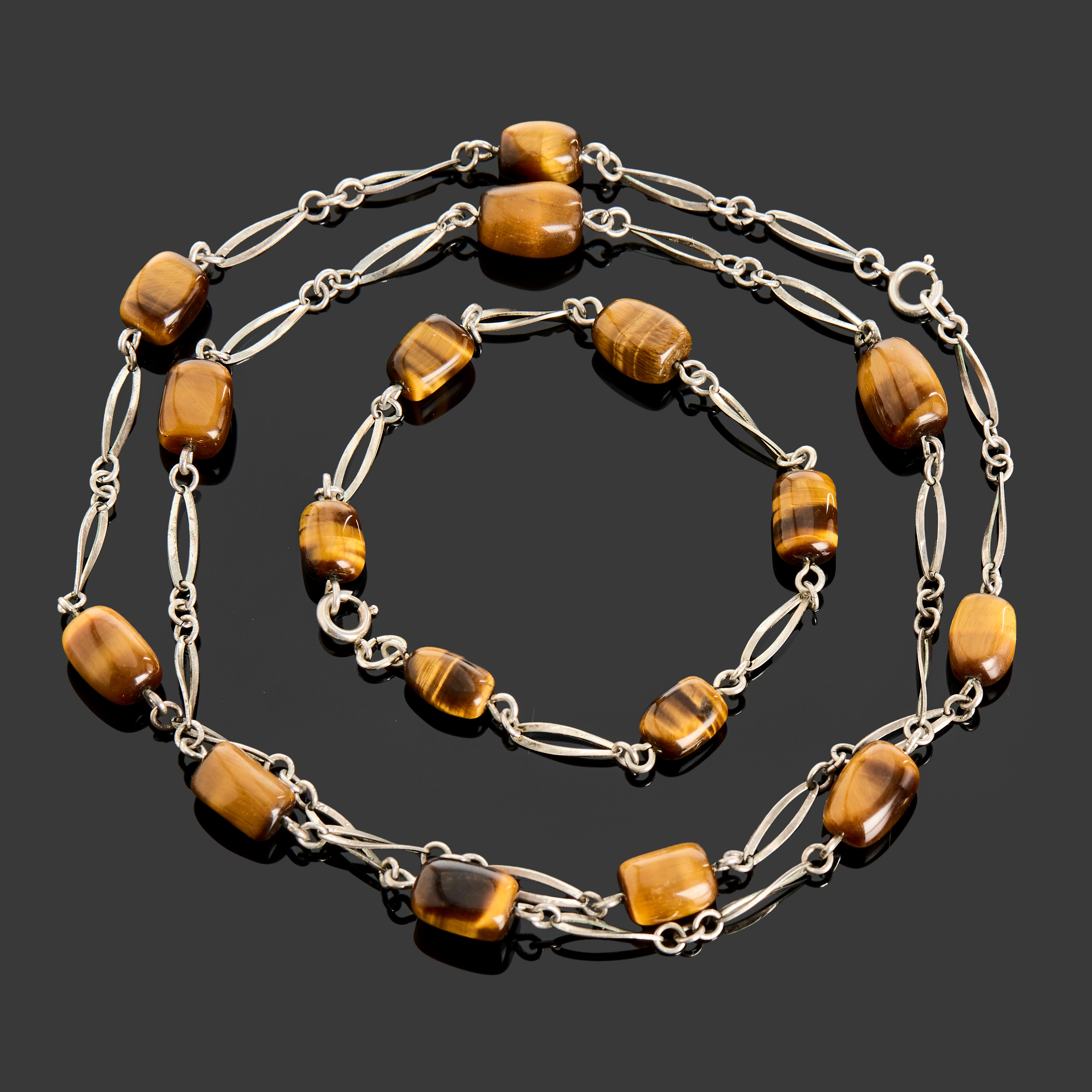 COLLIER SAMT ARMBAND, silver, twistade länkar varvat med tigeröga.
