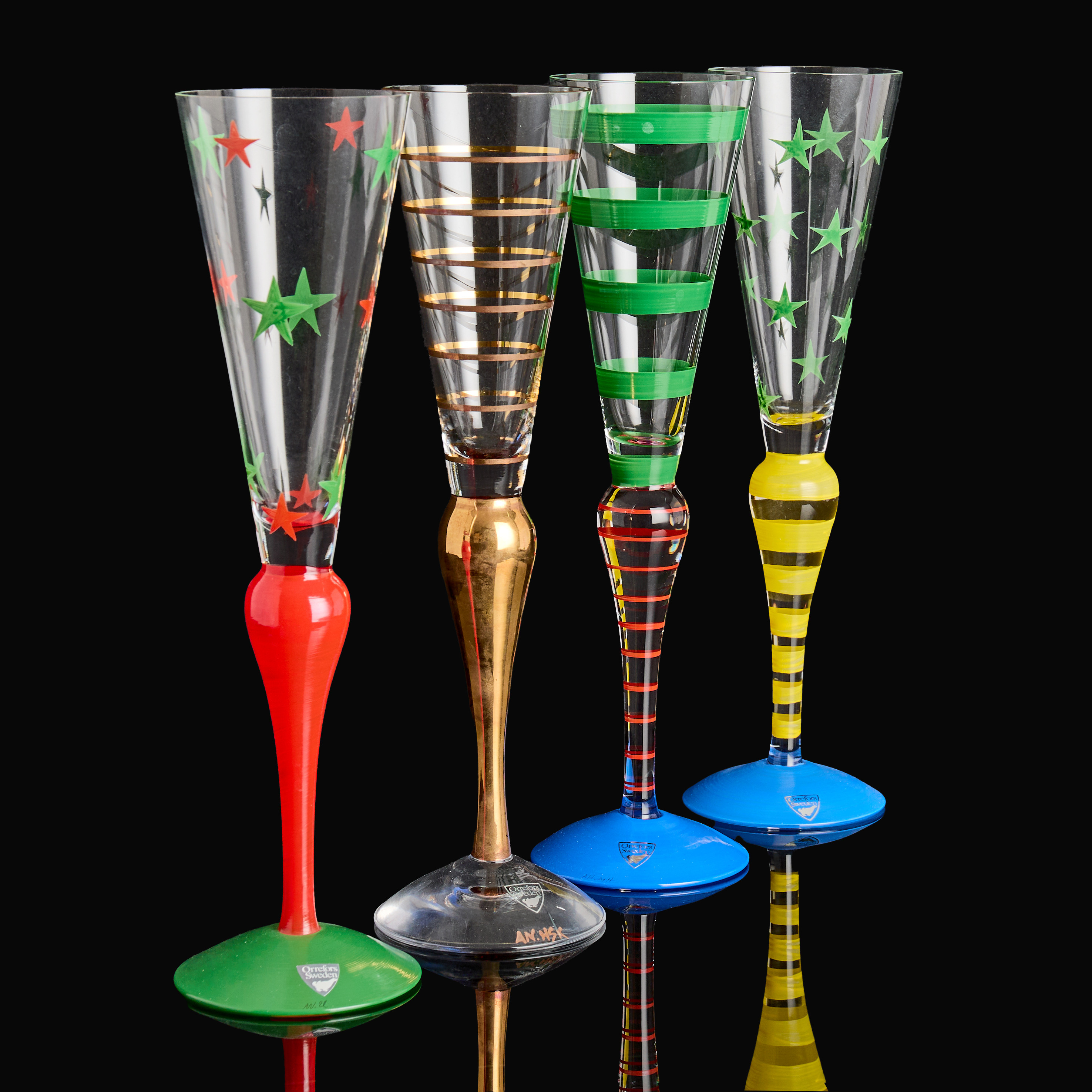 ANNE NILSSON. "Clown" (12 delar), champagneglas, 11 stycken samt 1 cocktailglas , Orrefors, signerade.
