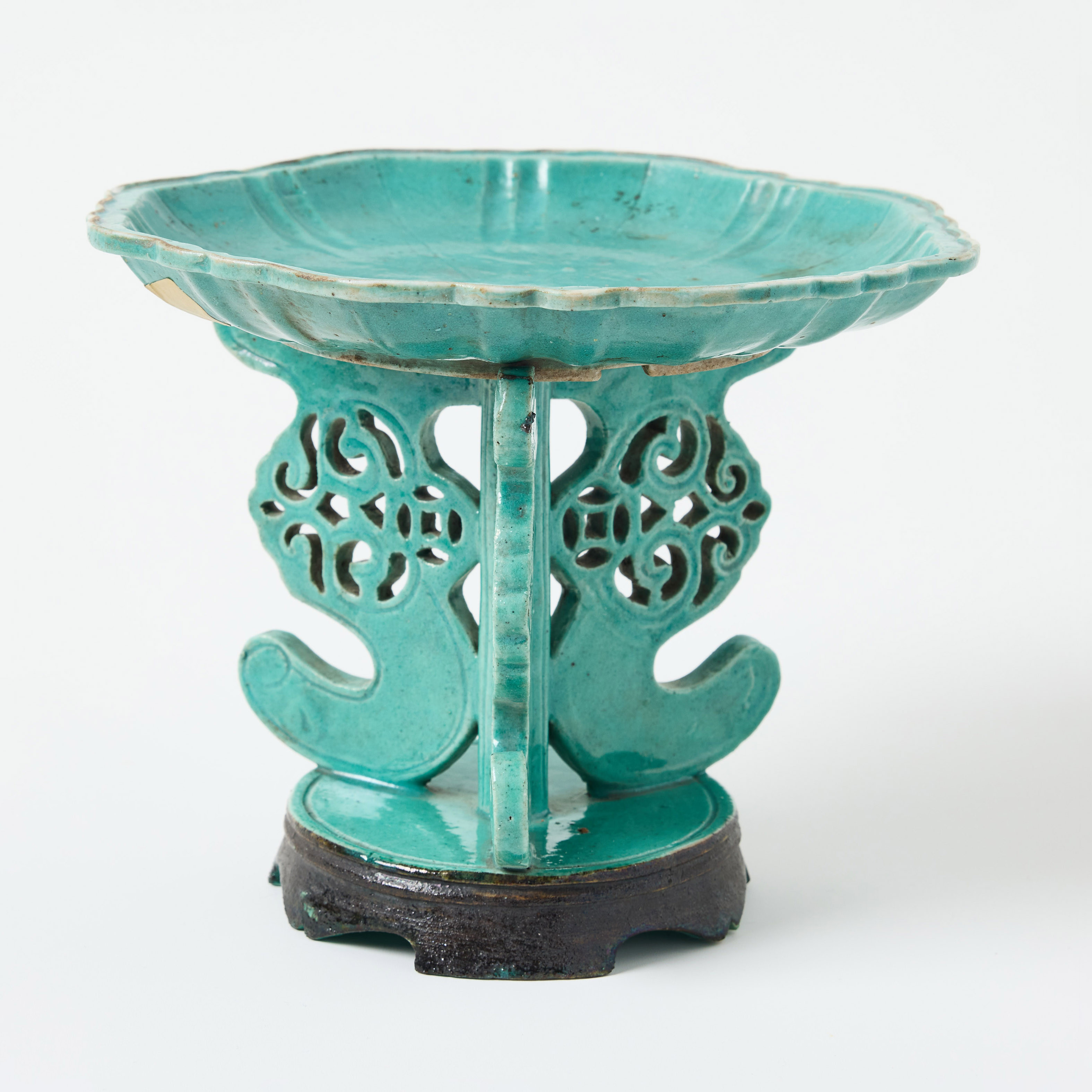 A Turquoise Glazed Chinese Dish on a Stand.
