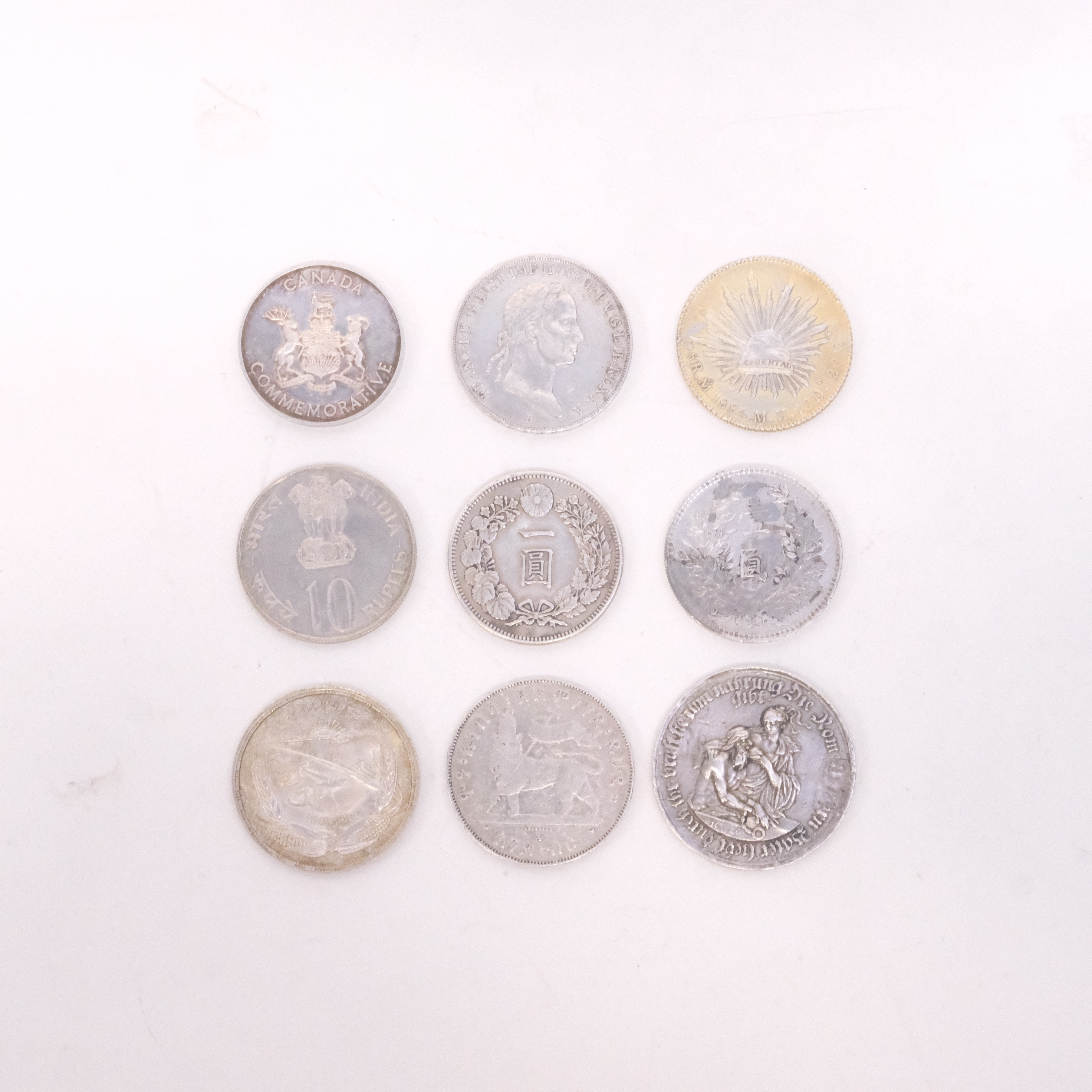 MINNESMYNT, DELVIS SILVER, NIO STYCKEN.