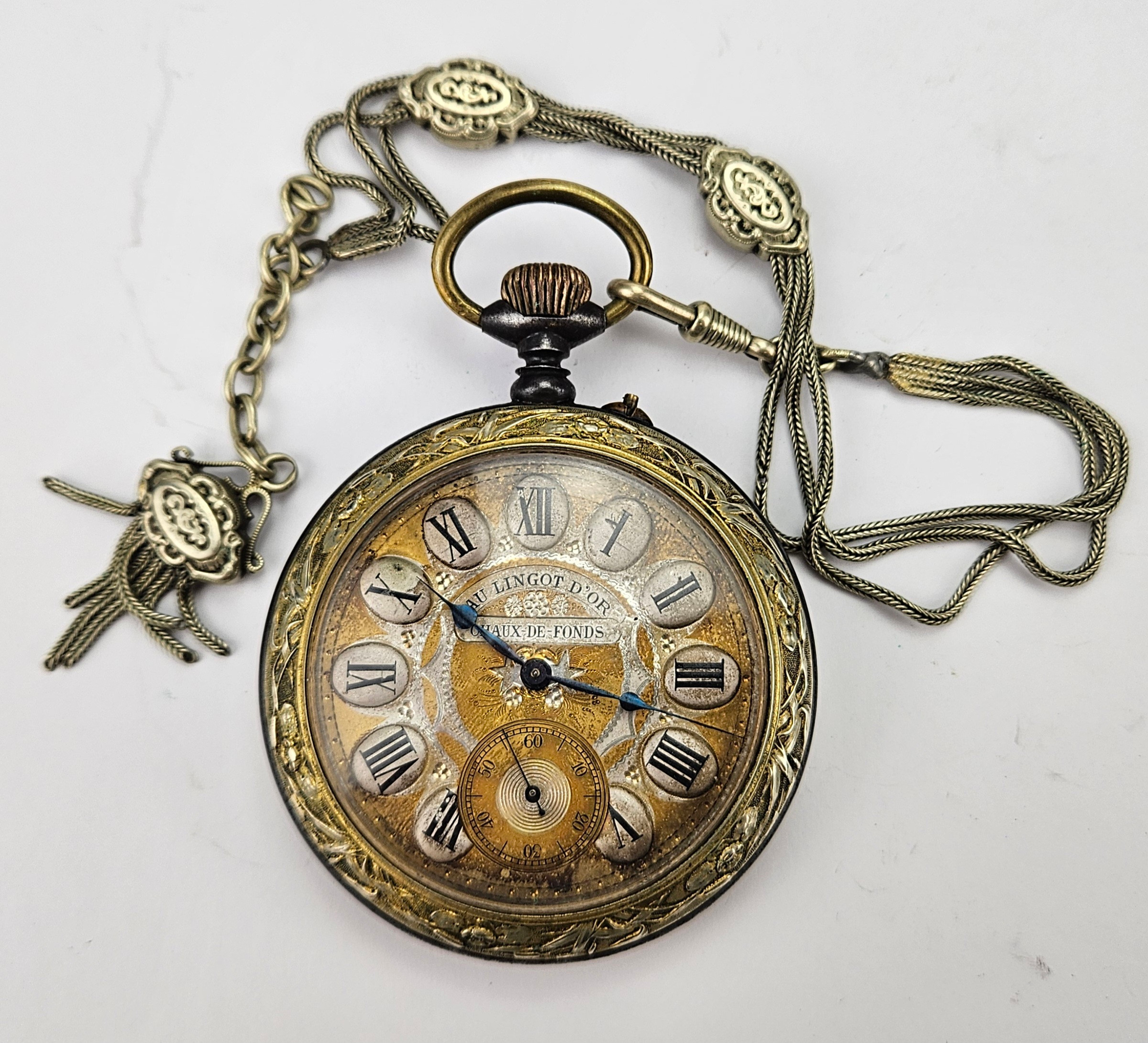 FICKUR, metall, Au Lingot D´or, Chaux de Fonds, 1900-tal.