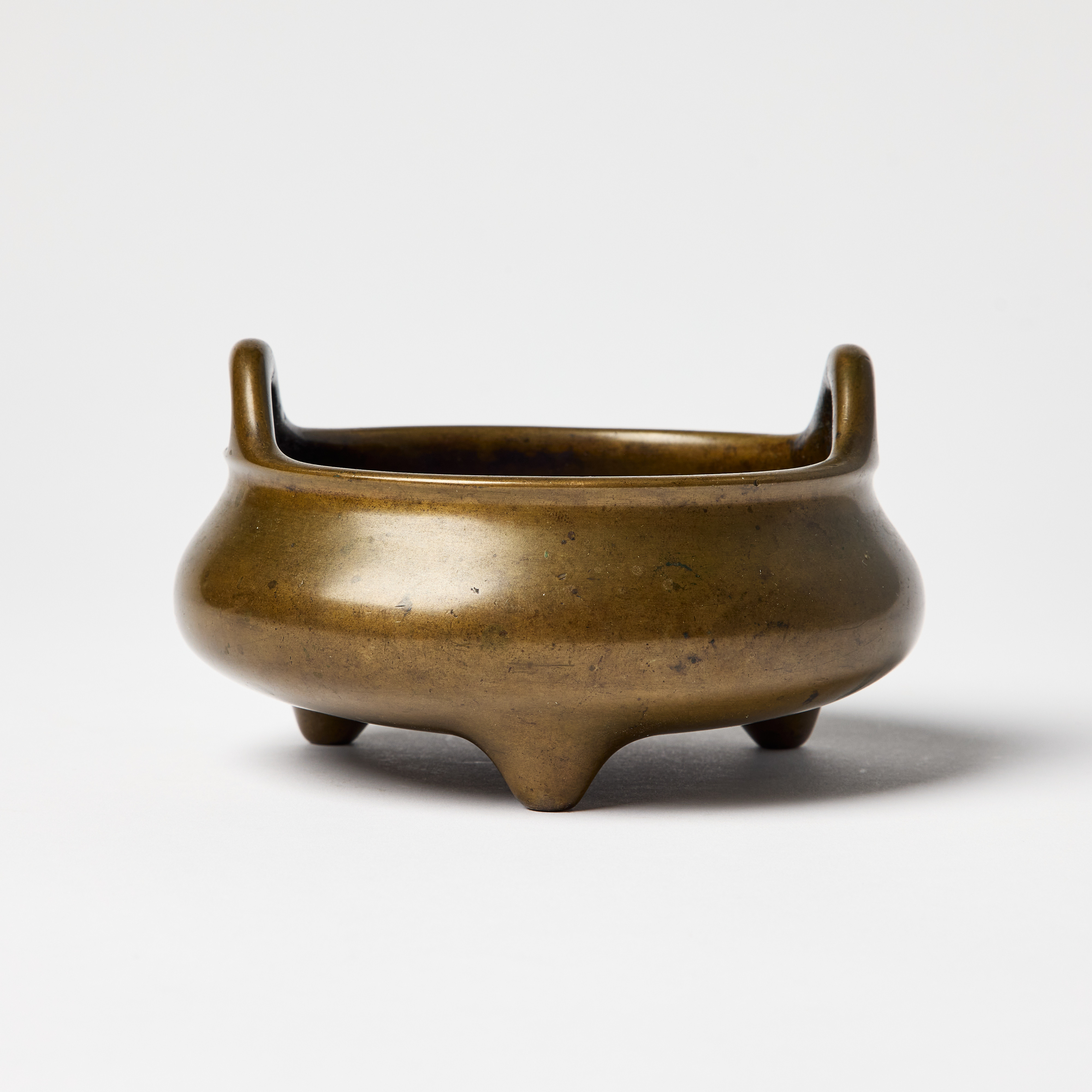 A Chinese Bronze Tripod Censer.
