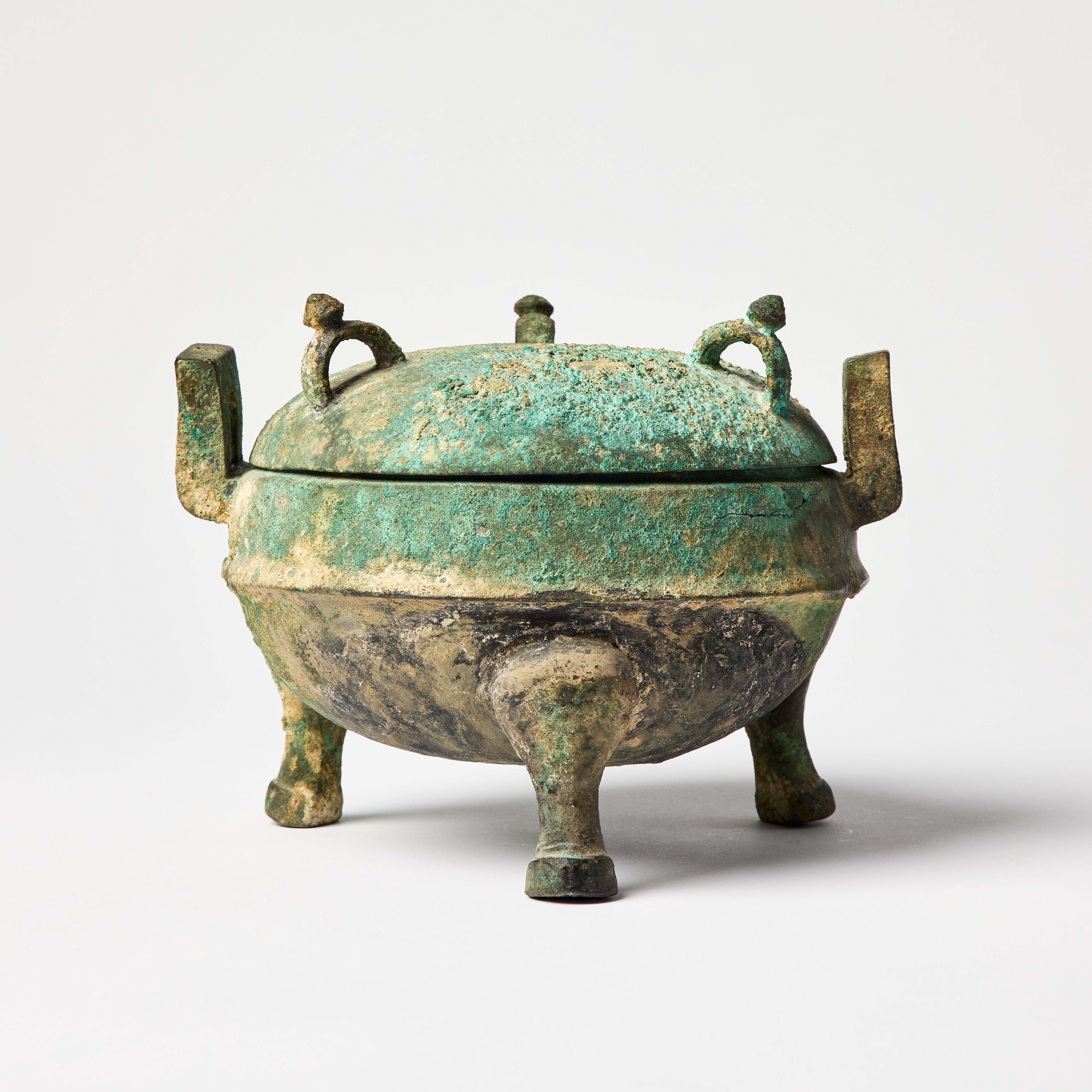 A Chinese Bronze Food Vessel and Cover.