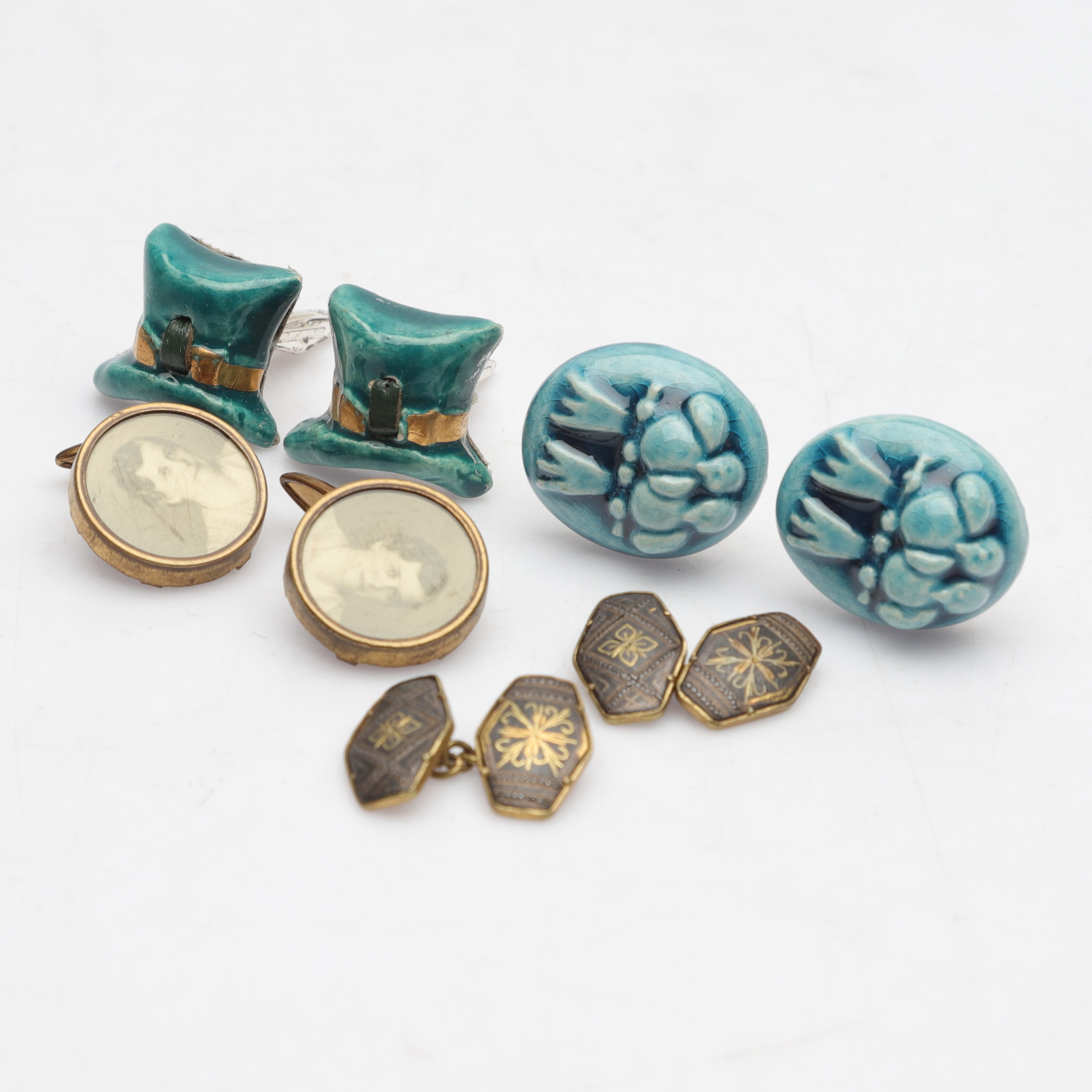 MANSCHETTKNAPPAR, 4 par, olika material, 1900-tal.