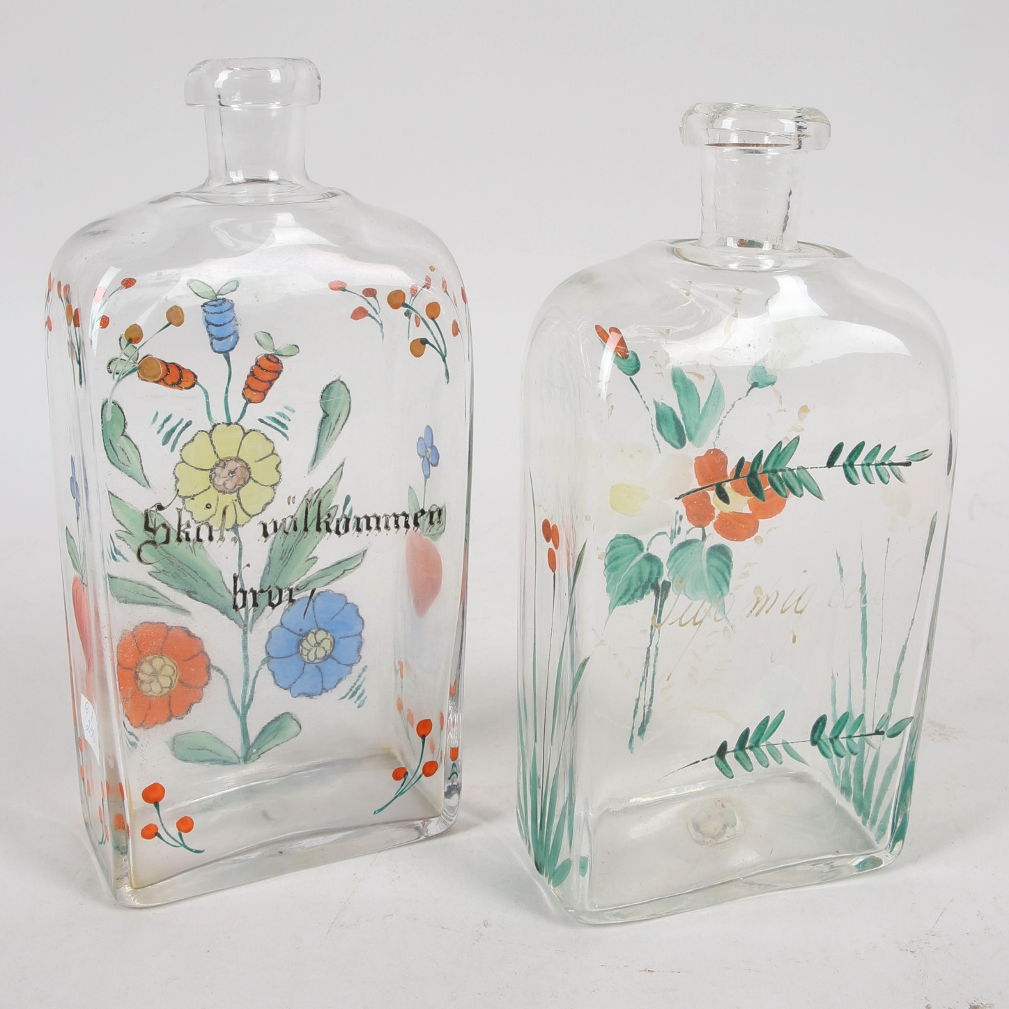 BRÄNNVINSFLASKOR, 2 st, glas, handmålade, 1800-tal.