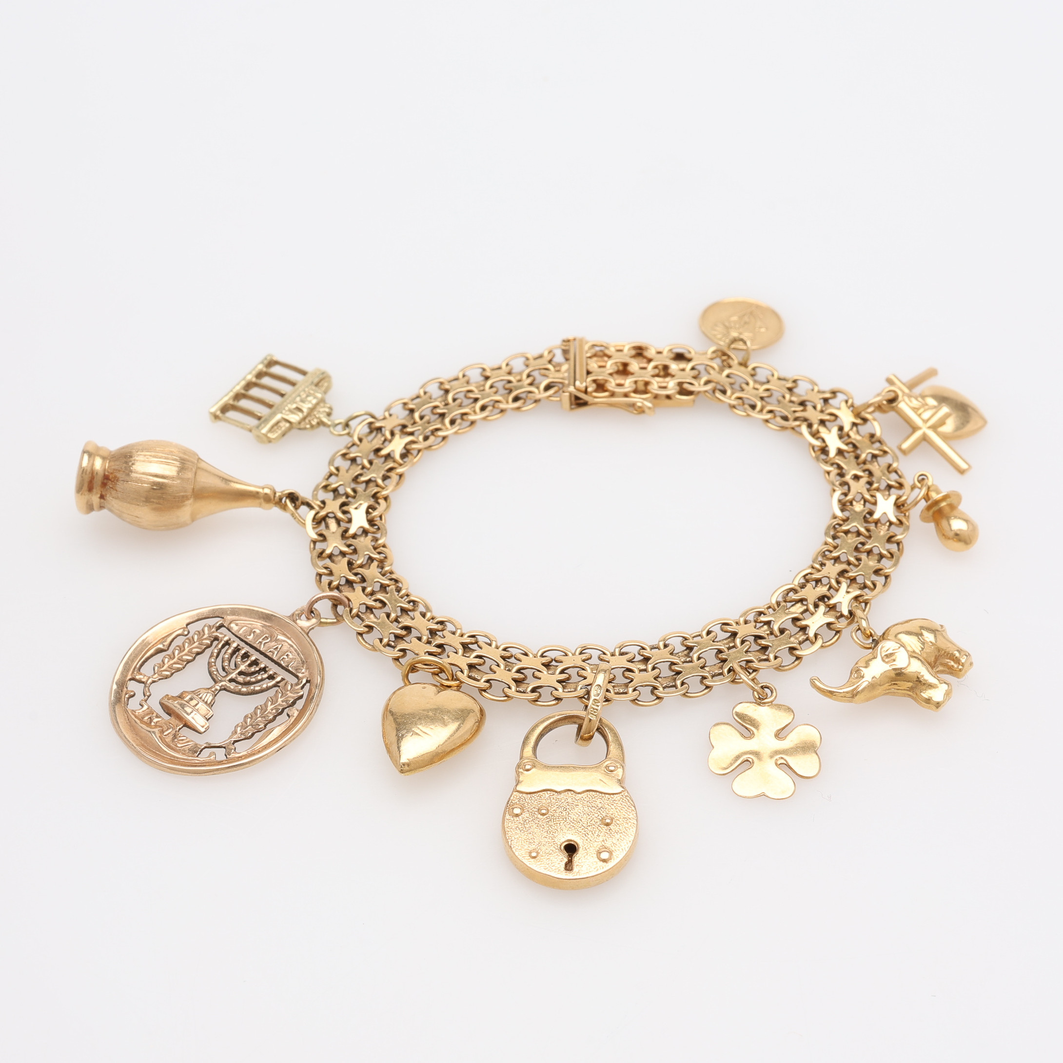 ARMBAND, X-LÄNK MED BERLOCKER, 14K SAMT 18K GULD, TOTAL VIKT CA 26,7 GRAM.
