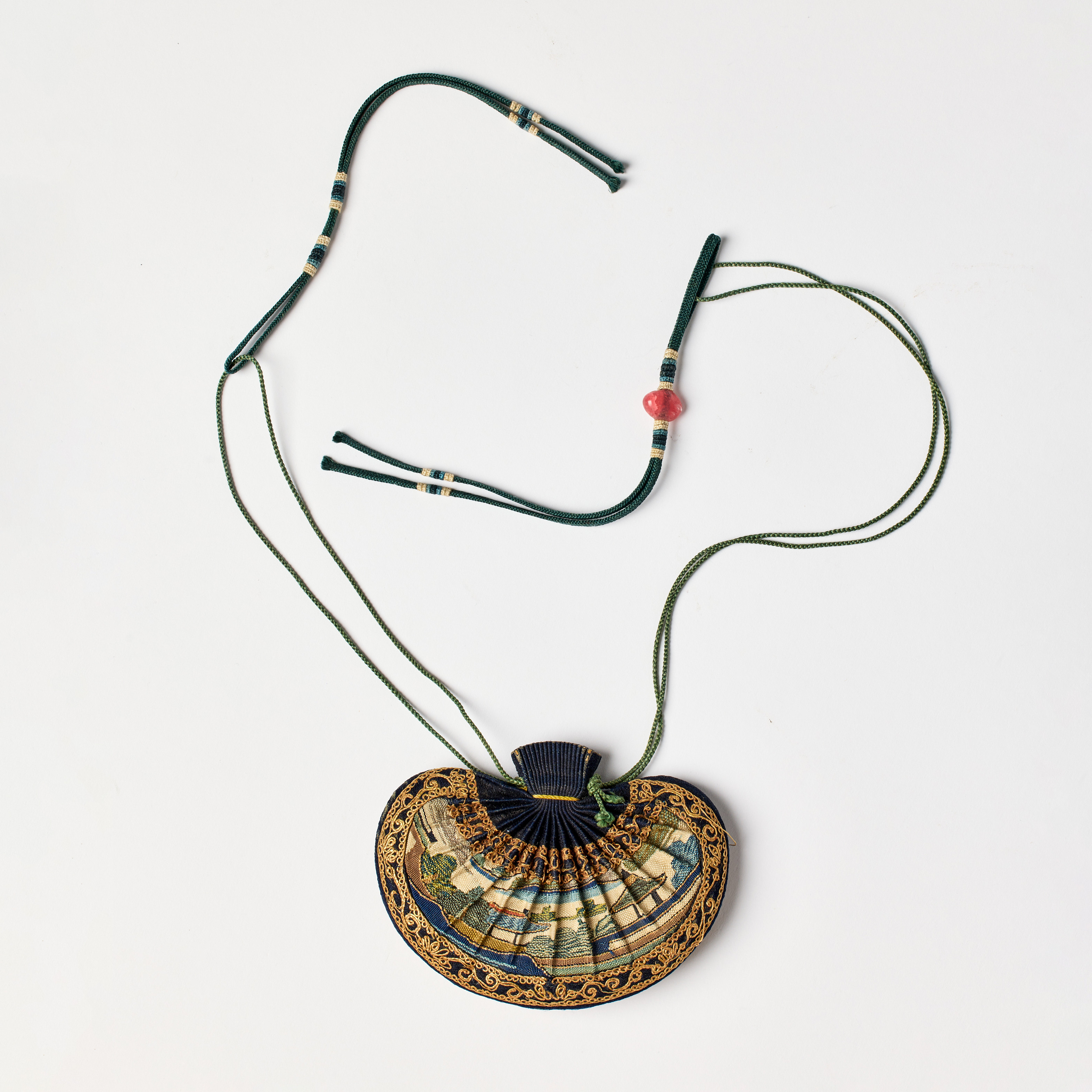 A Chinese Blue and Cream-Ground Kesi Pouch-Shaped Purse.