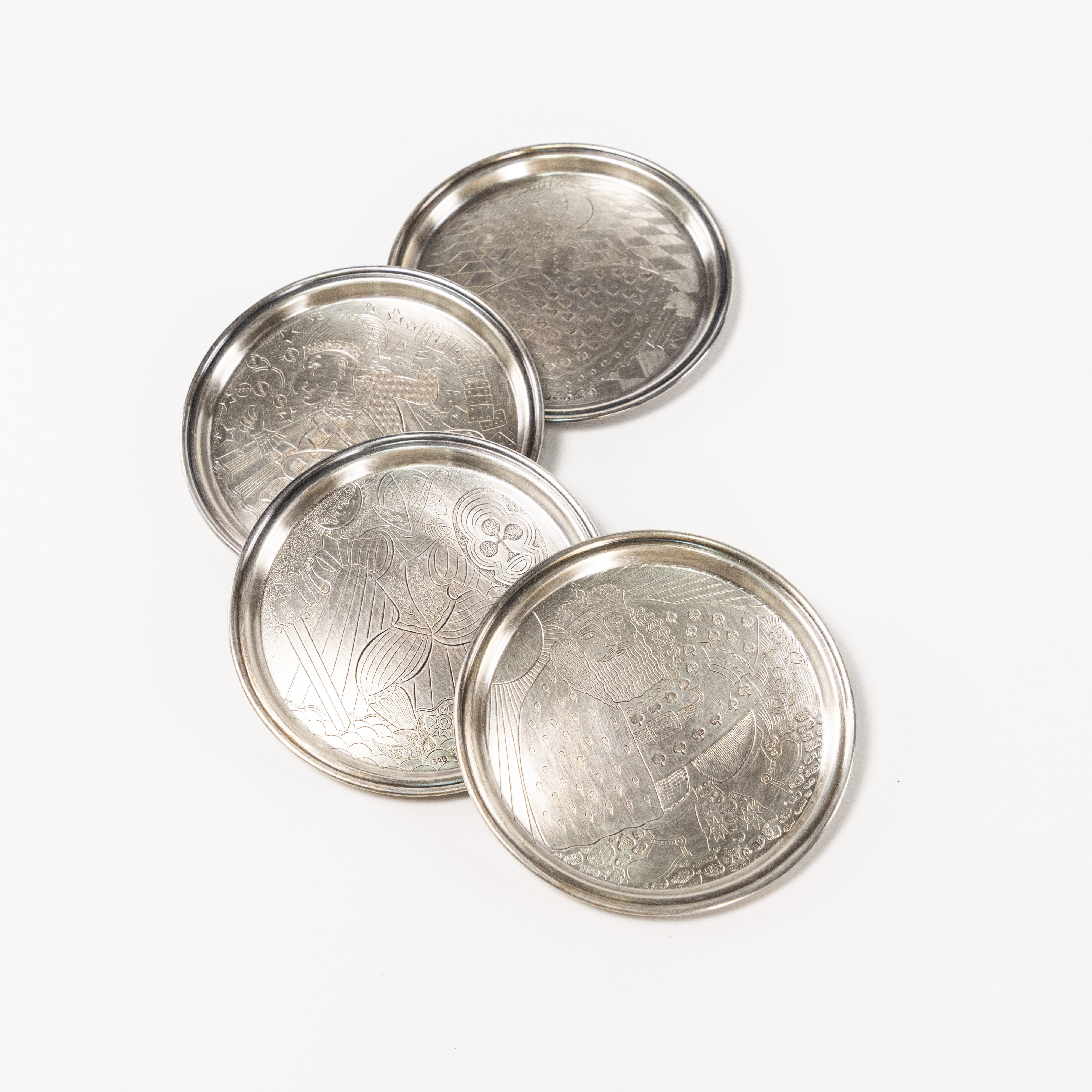 COASTERS. 4 st, silver, GAB, spelkortsmotiv.