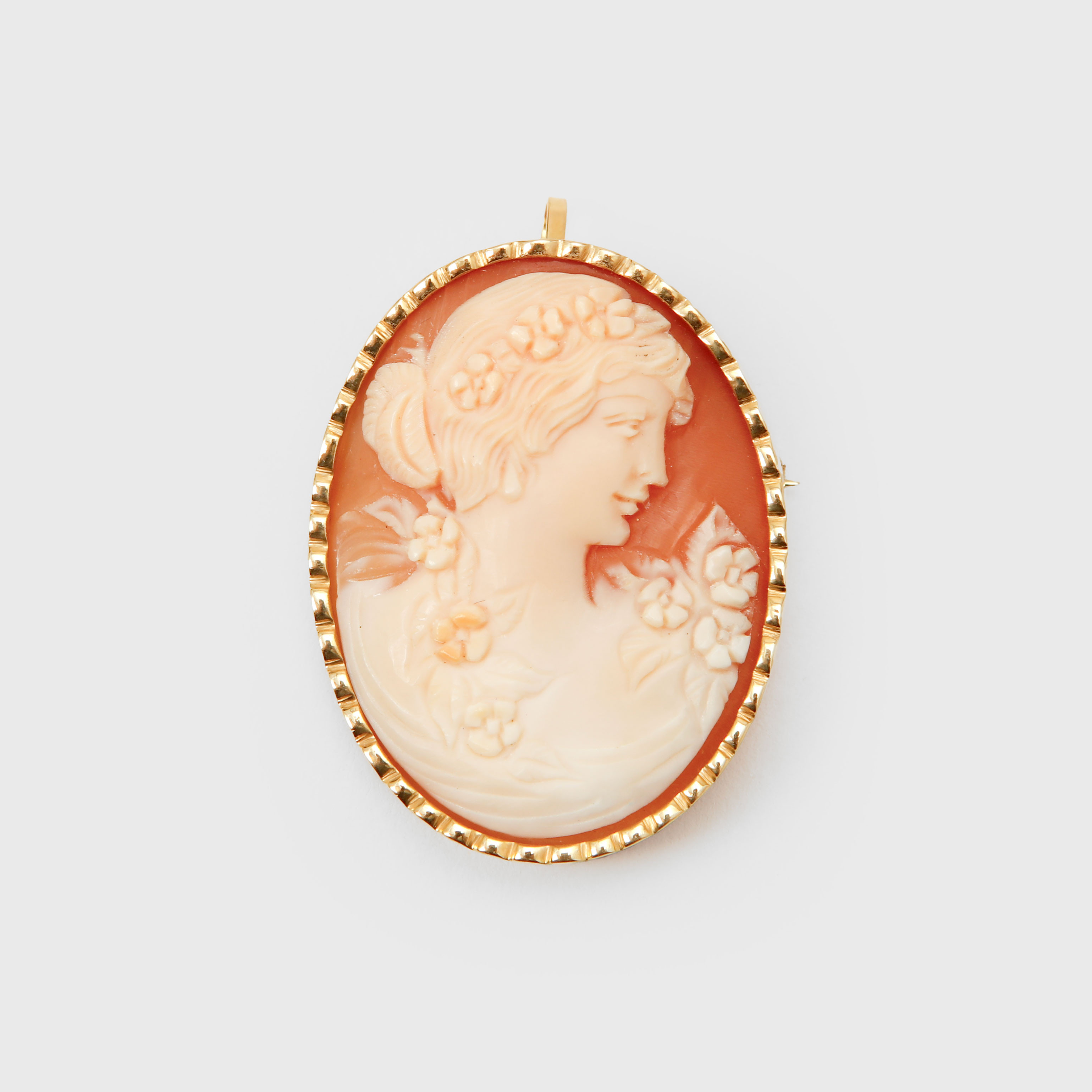 BROSCH/ HÄNGE, 18k guld, snäckskalskamé, totalvikt ca 8,4 gram.