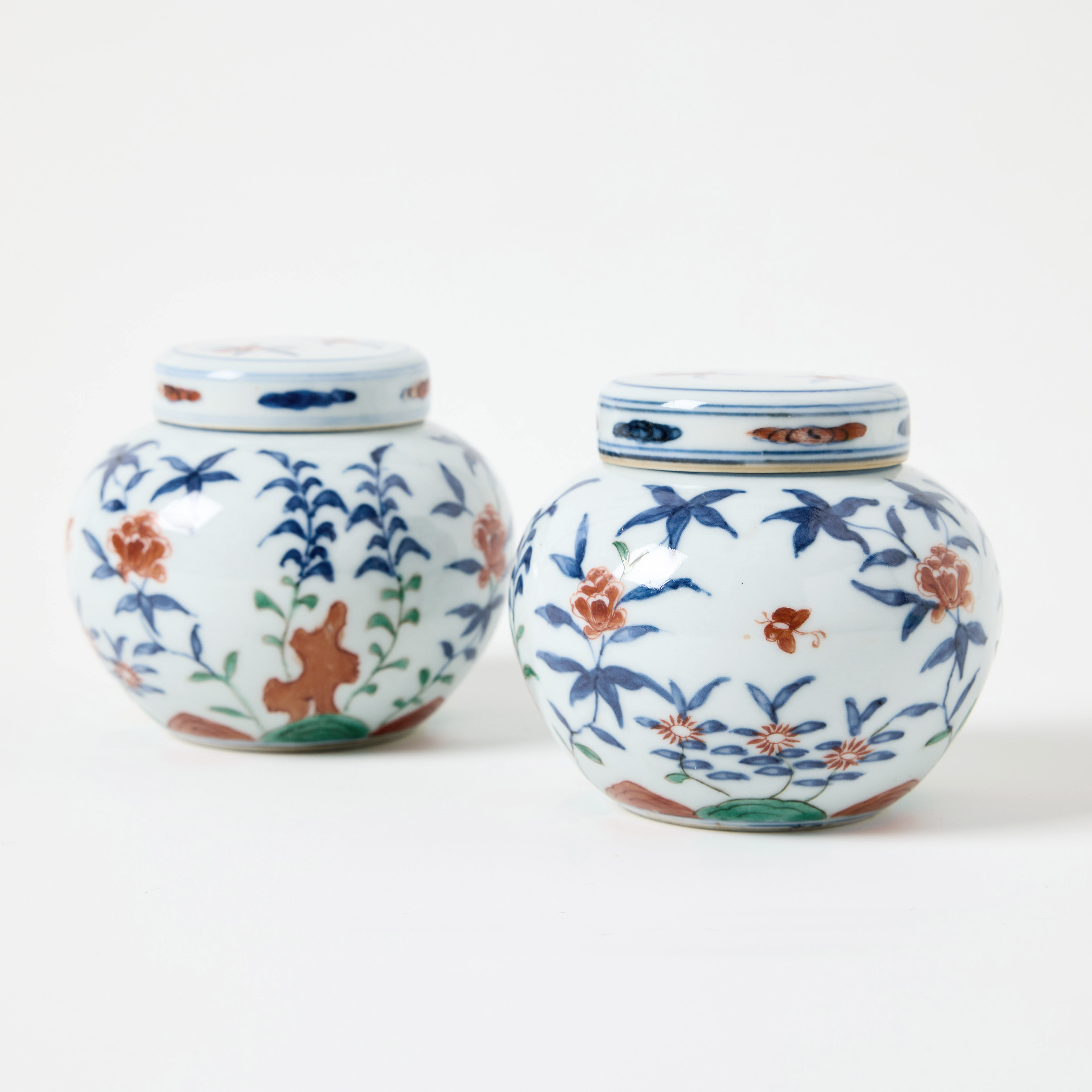 A Pair of Small Chinese Ming-Style Doucai Jars and Covers.