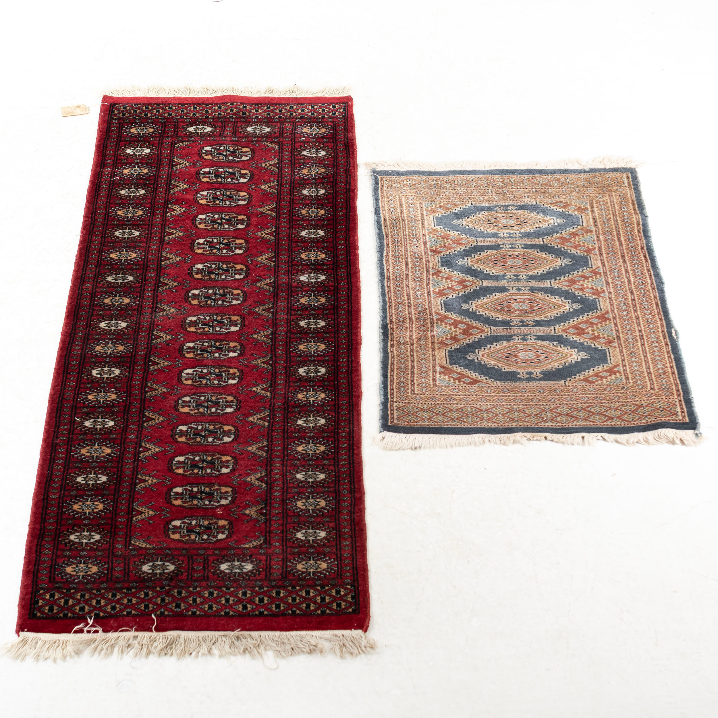 MATTOR, 2 st handknutna b.la bokhara, ca 180 x 62 cm.