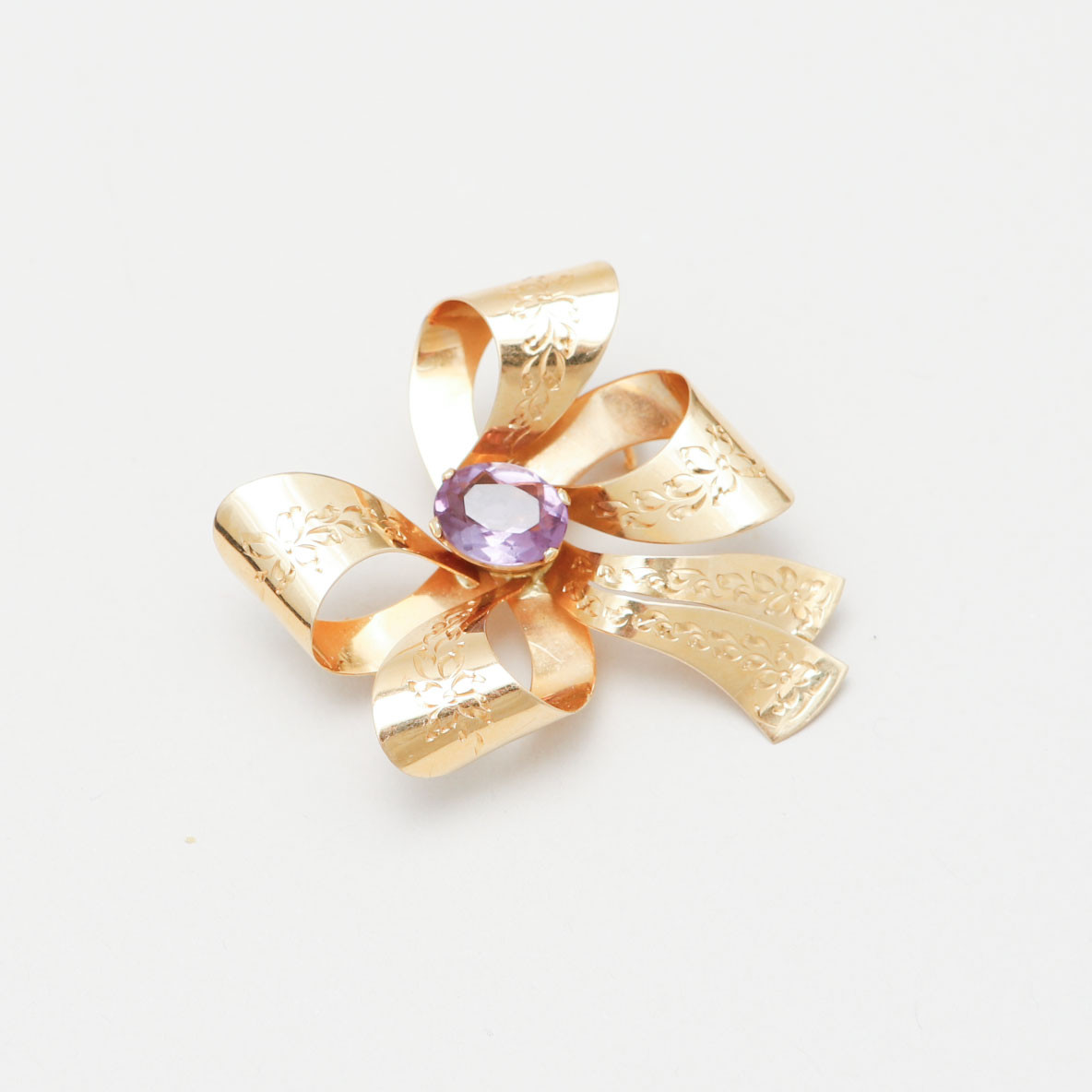 BROSCH, 18k guld, ametist, vikt ca 5,8 gram.