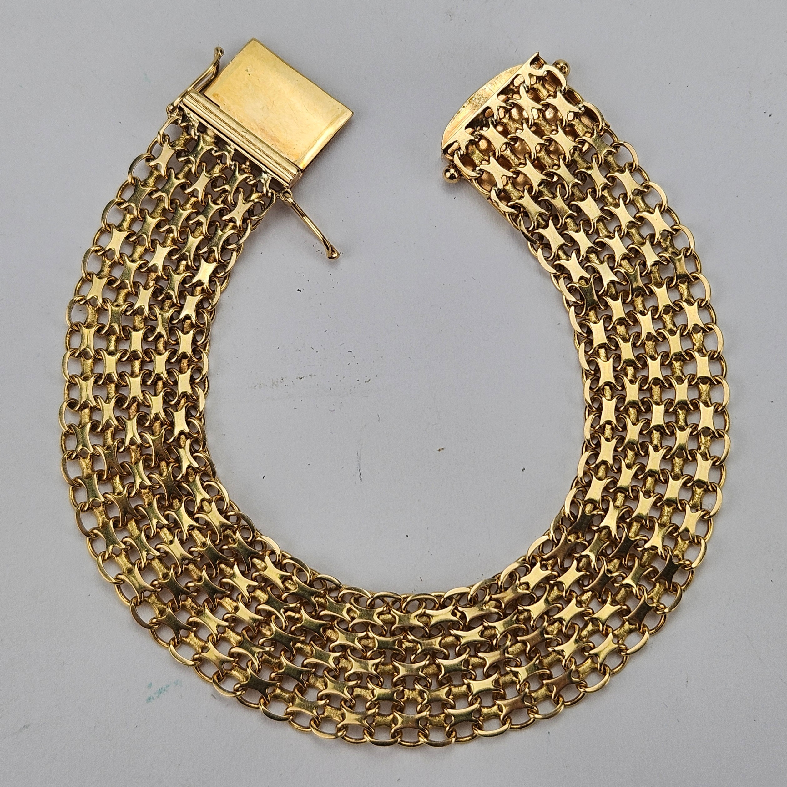 ARMBAND, "X-länk", guld, 18K, Guldfirman Esto Ab, Stockholm 1965, vikt ca. 22,1 gram.