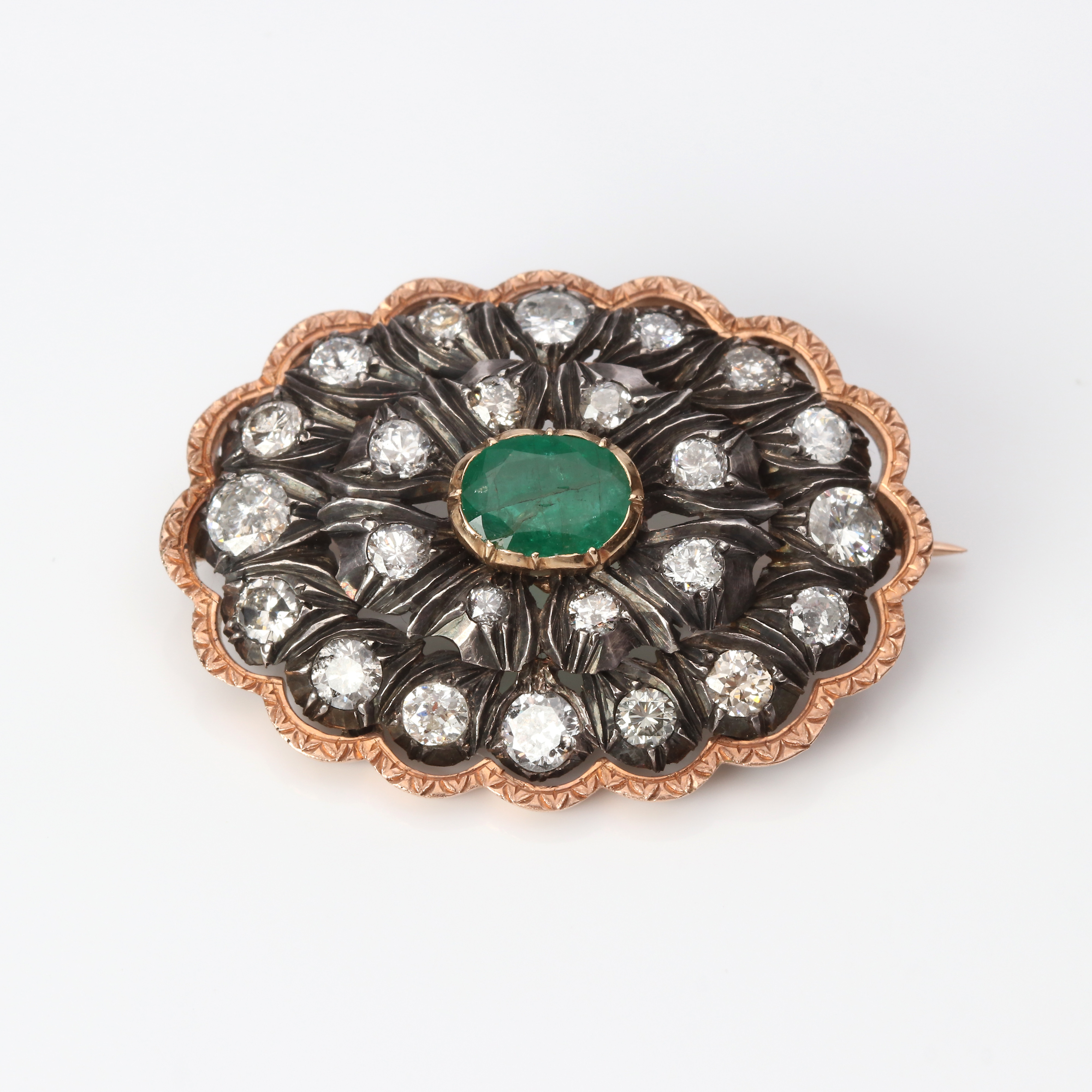 BROSCH I SILVER MED GULDKANT 14K.