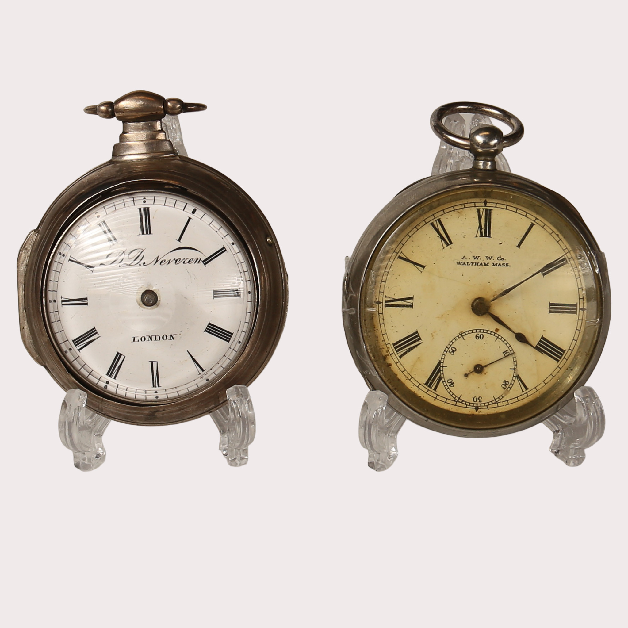 FICKUR, vitmetall, A.W.W. Co. WALTHAM U.S.A. Omkring 1900. D.D.NEVEREN, London, före 1850. totalt 2 stycken.