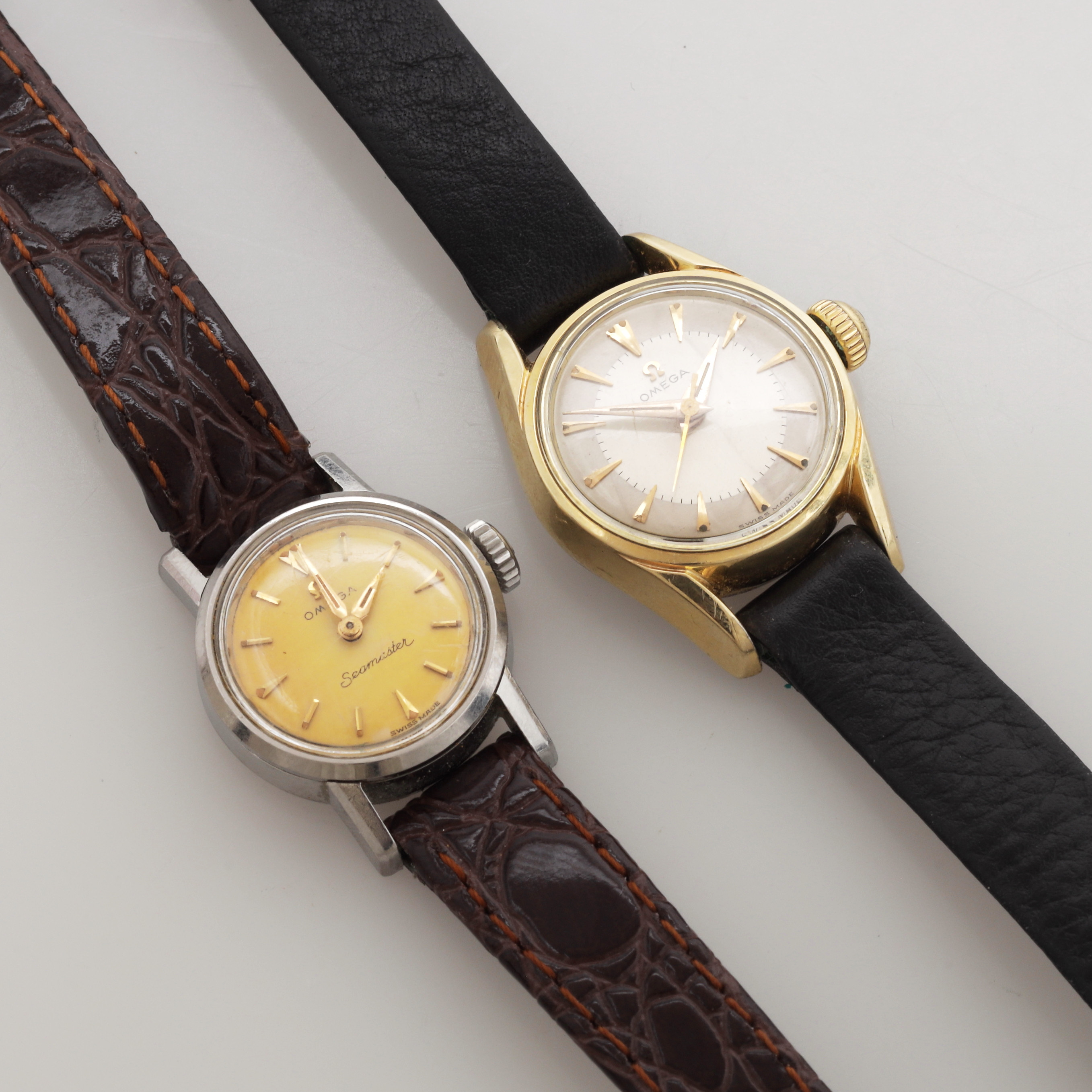 DAMARMBANDSUR, 2 st, stål/guld på stål, Omega.