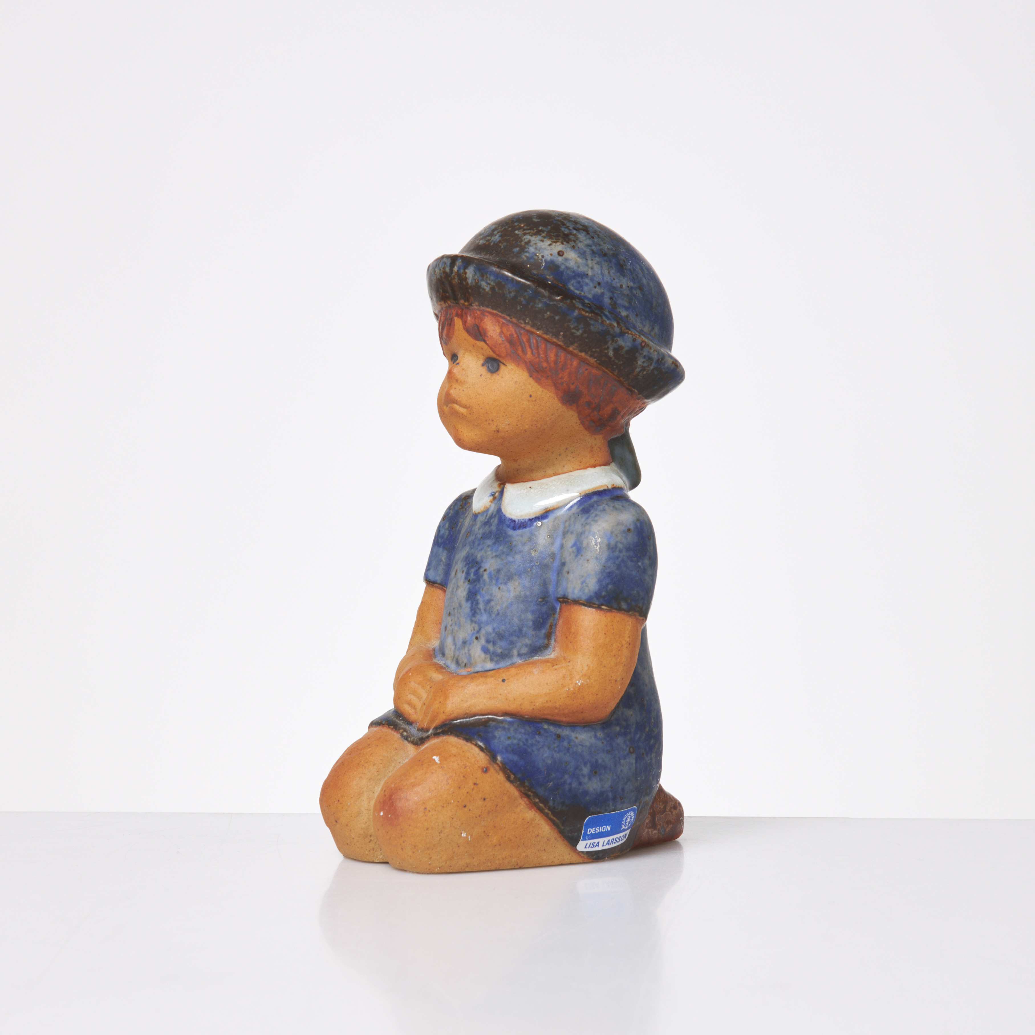 LISA LARSON. "Sommarklädd", figurin, glaserat stengods, undertill märkt, K-Studion, Gustavsberg.