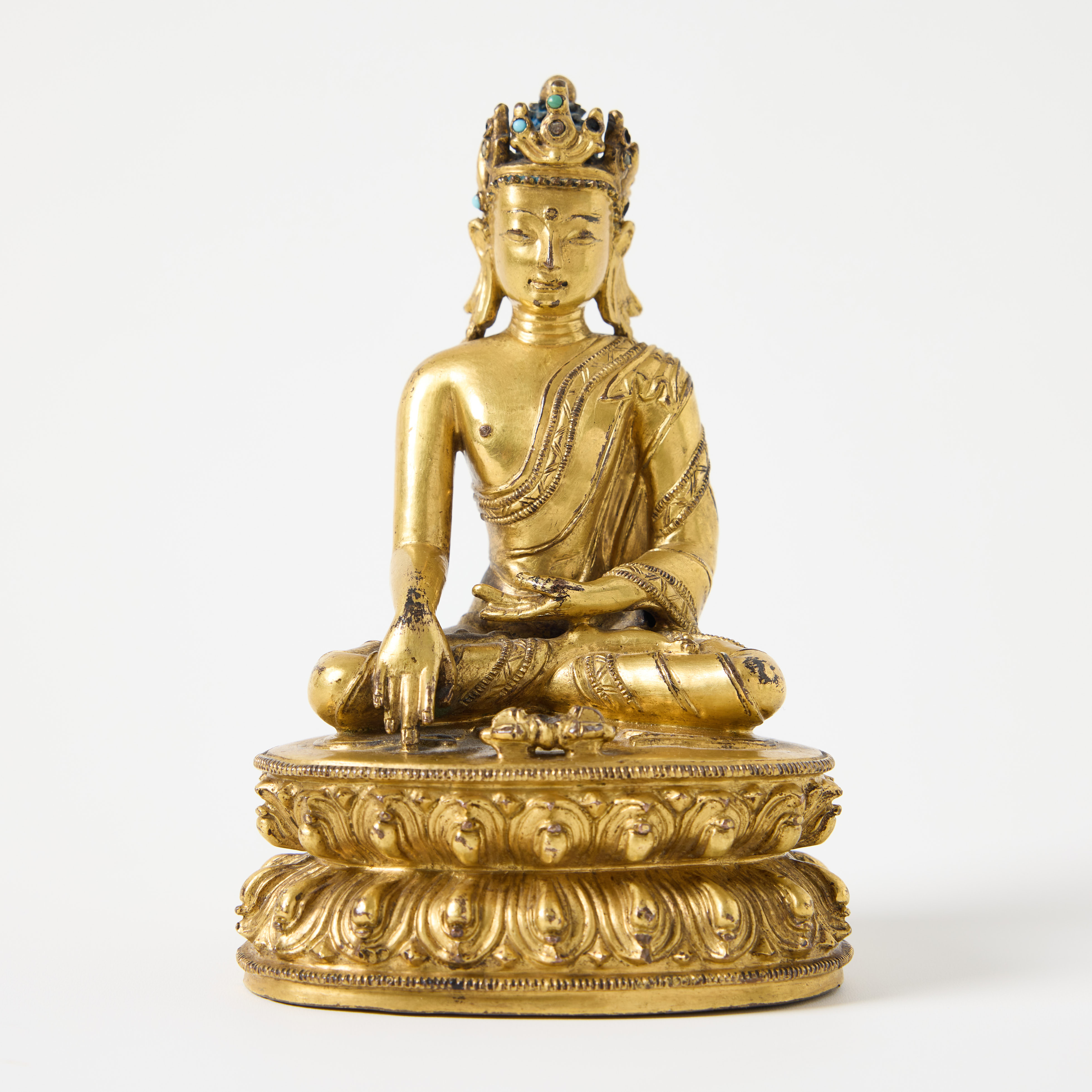A Tibetan Gilt Copper Alloy Figure of Akshobhya.