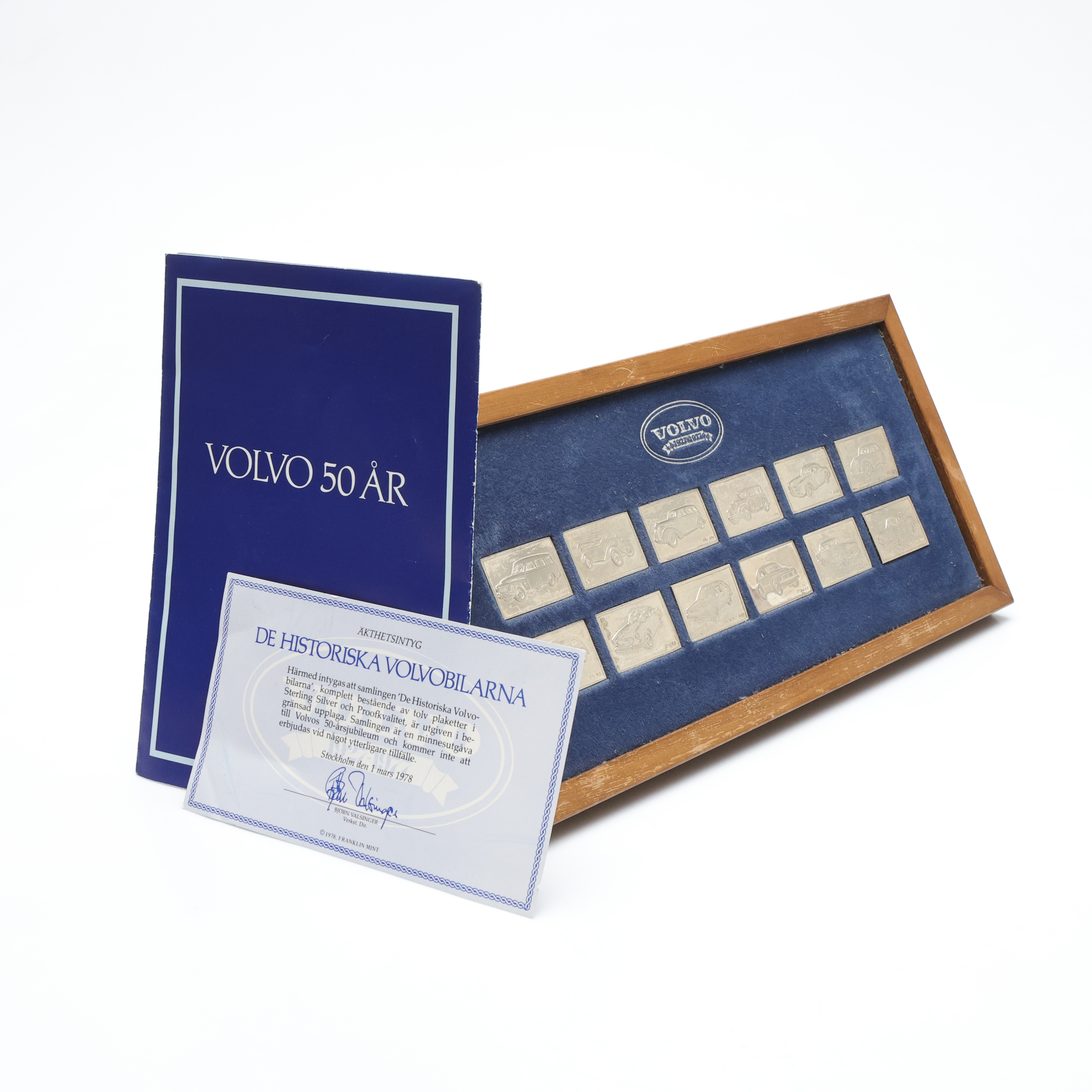 PLAKETTER, 12 st, sterlingsilver, "De Historiska Volvobilarna", Franklin Mint, 1978.