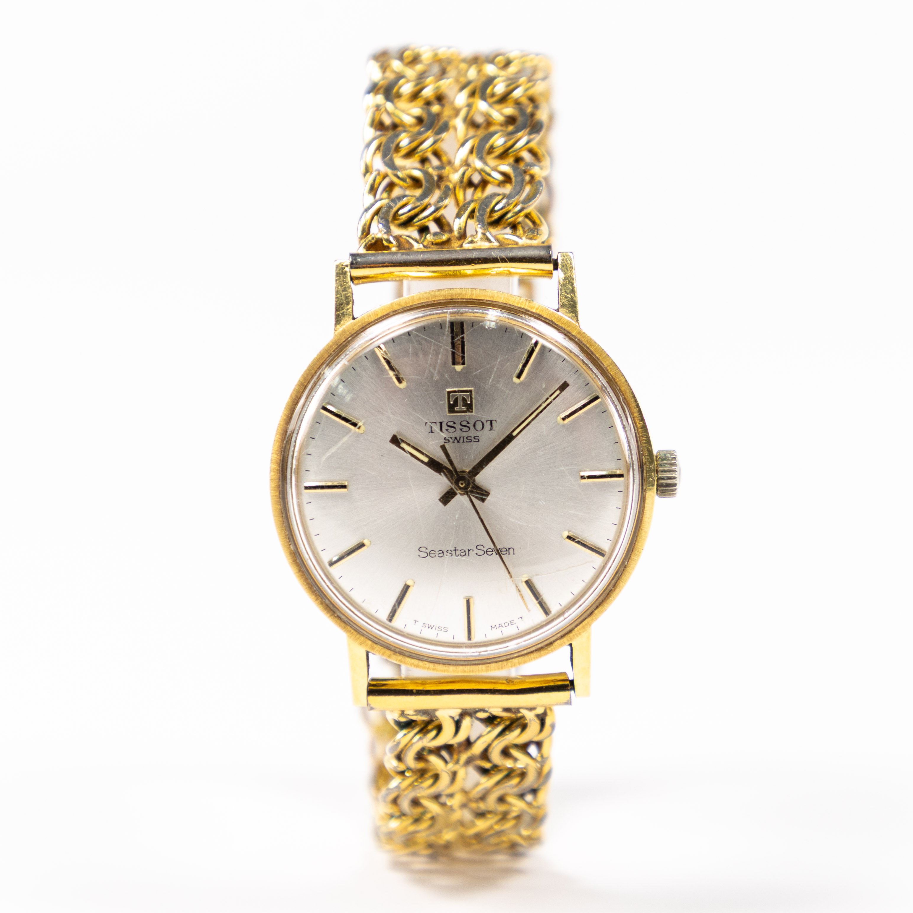 TISSOT. 34 mm, 18k guld.