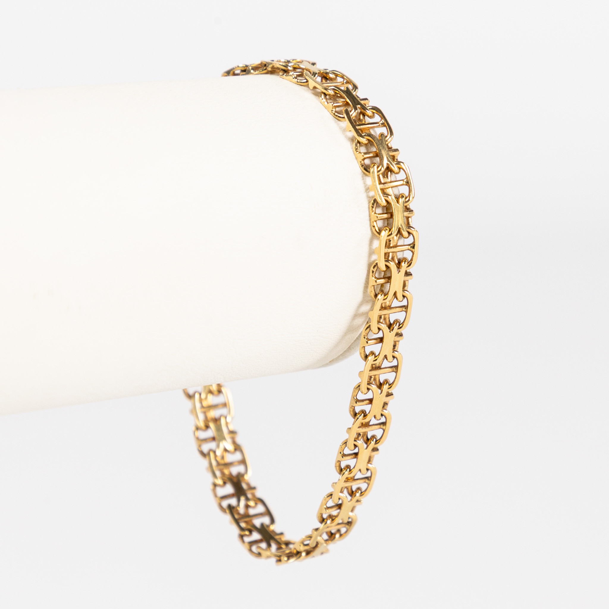 ARMBAND. X-länk, 18k guld.