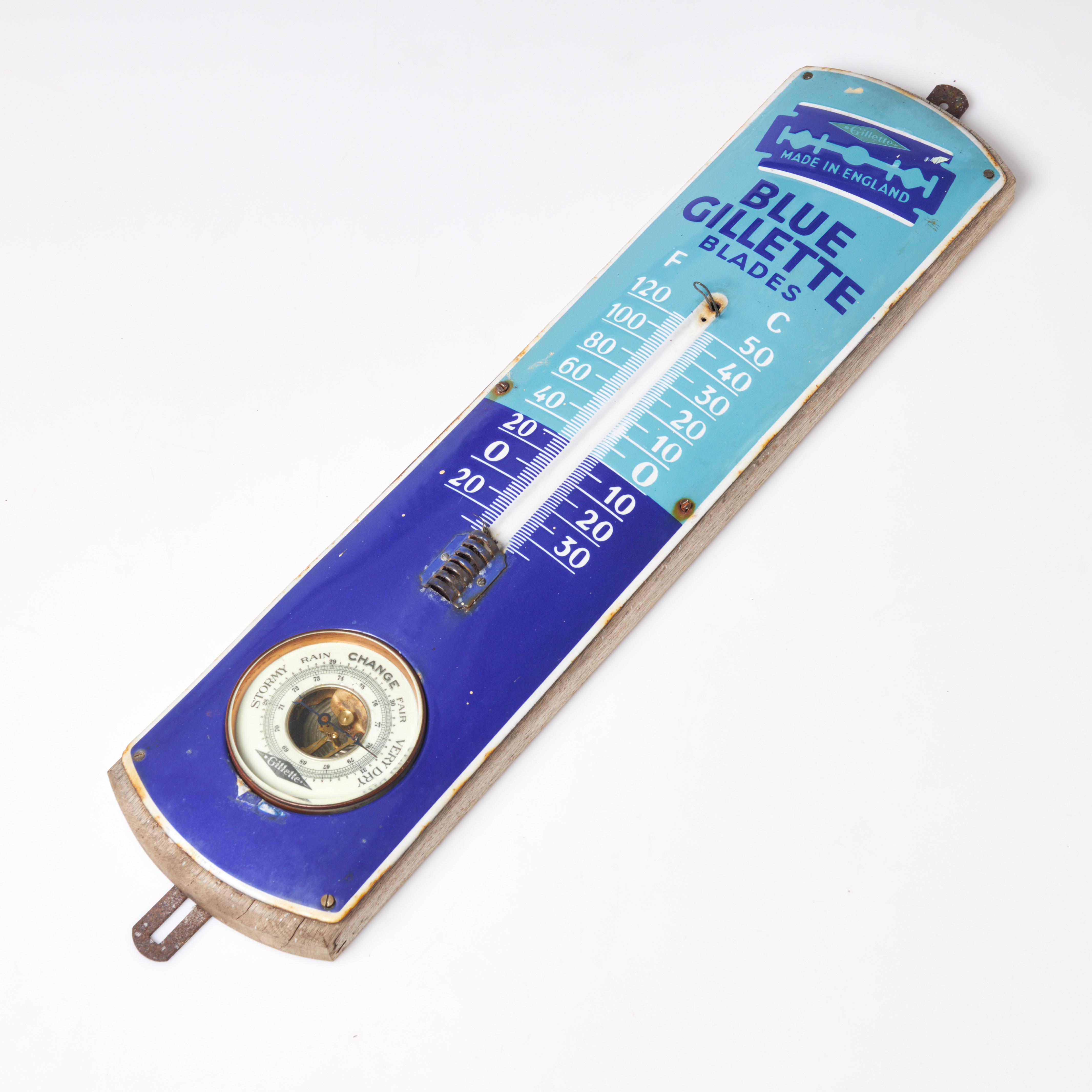 SKYLT. Emalj, Blue Gilette Blades, emlaj, 1900-talets mitt, med barometer.