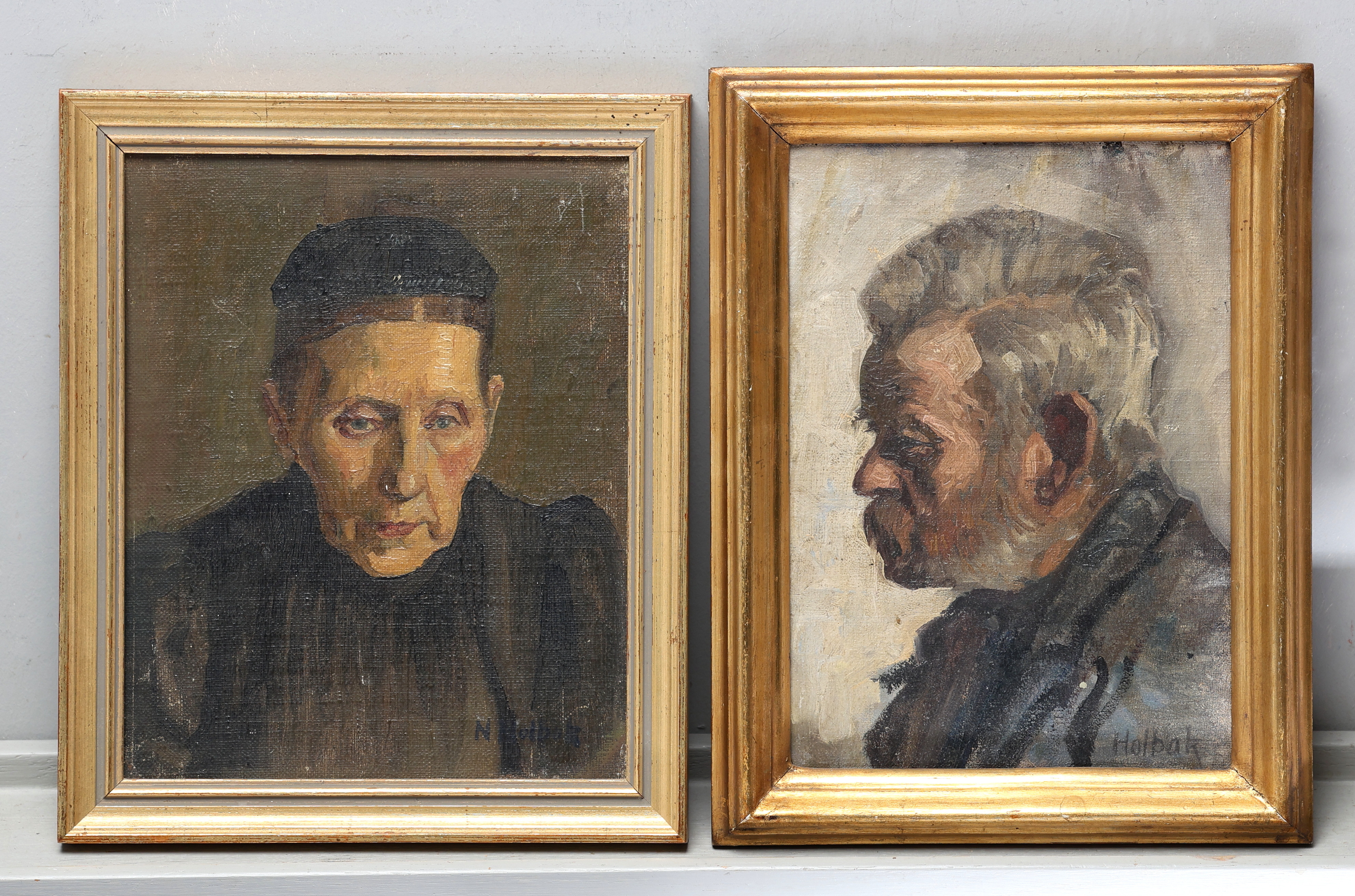 NIELS HOLBAKCK (1884-1954). 2 porträtt, olja på pannå, signerade.