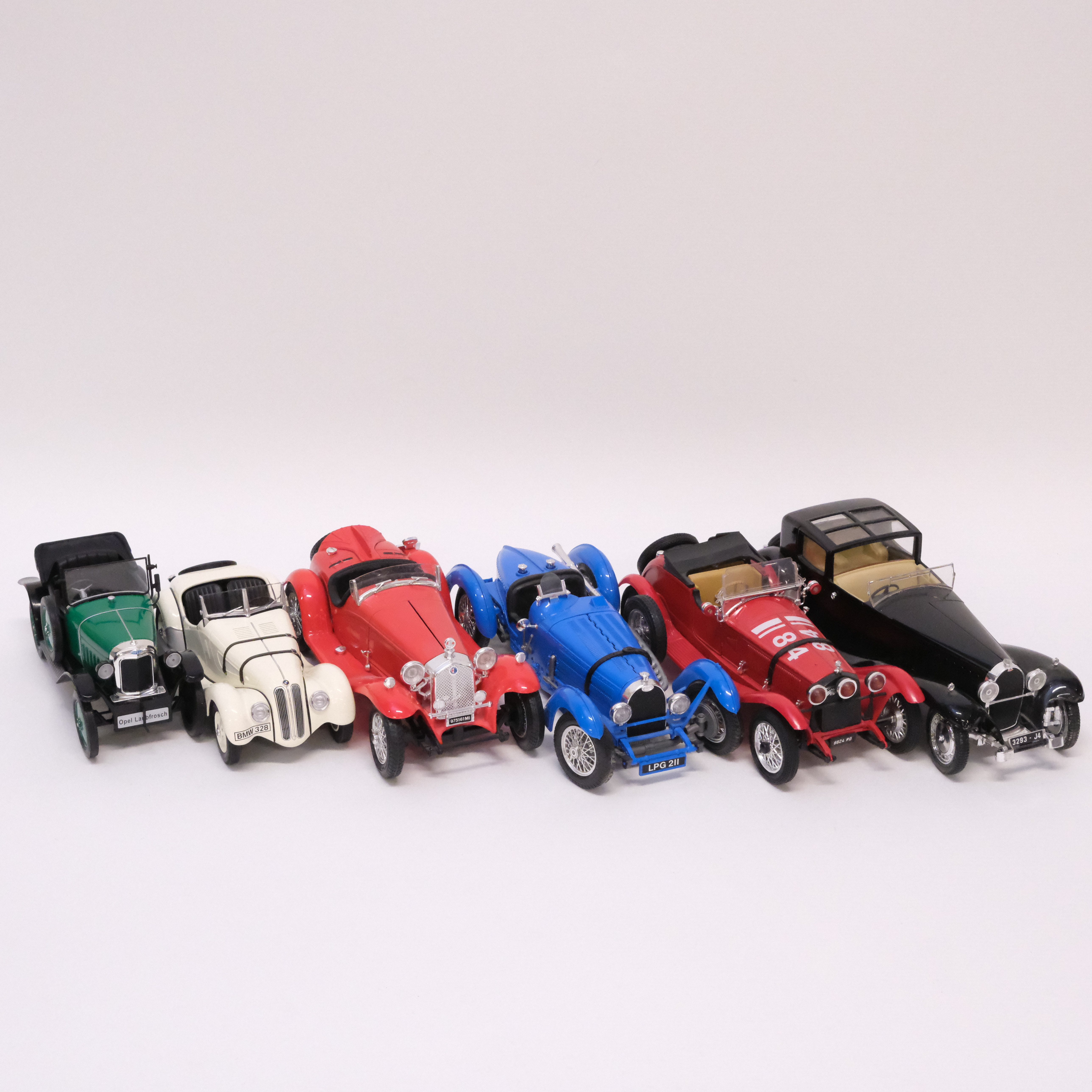 SEX MODELLBILAR. BBURAGO, SOLIDO, PAULS MODEL ART OCH POLISTIL/TONKA. SKALA 1:18.