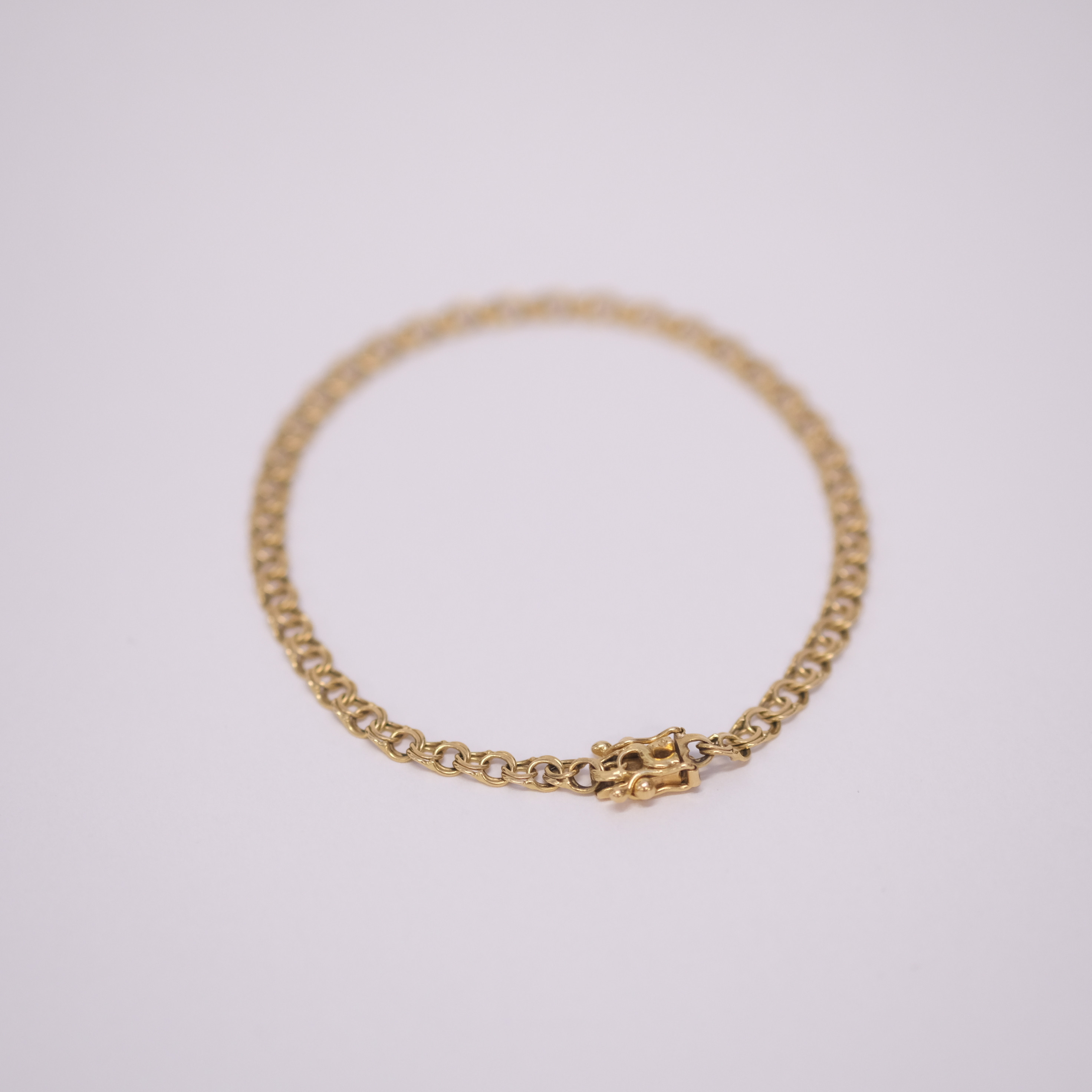 ARMBAND, "BISMARCK", 18K GULD.
