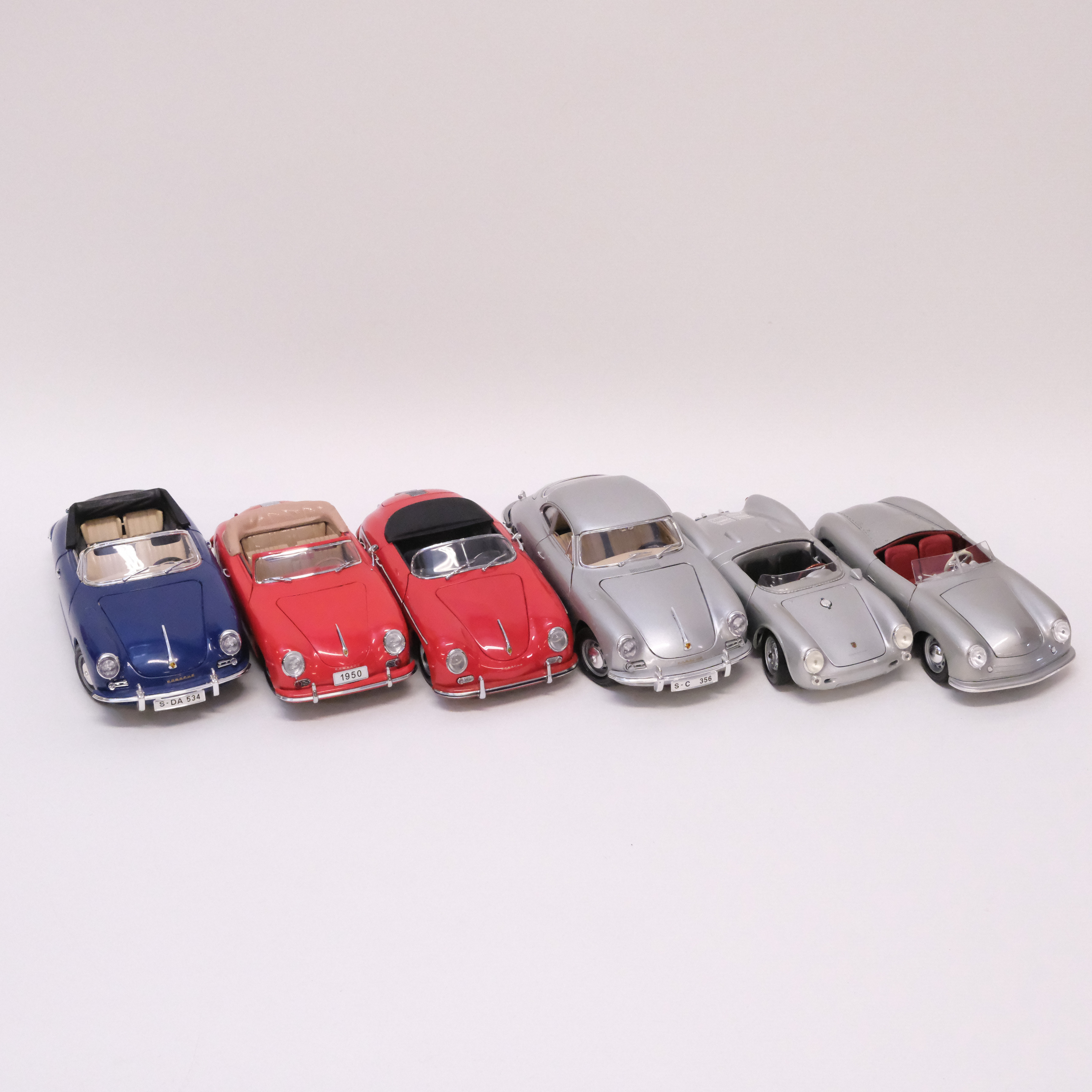 SEX MODELLBILAR, PORSCHE-FORDON. MAISTO, BBURAGO, SIGNATURE MODELS OCH KYOSHO. SKALA 1:18.