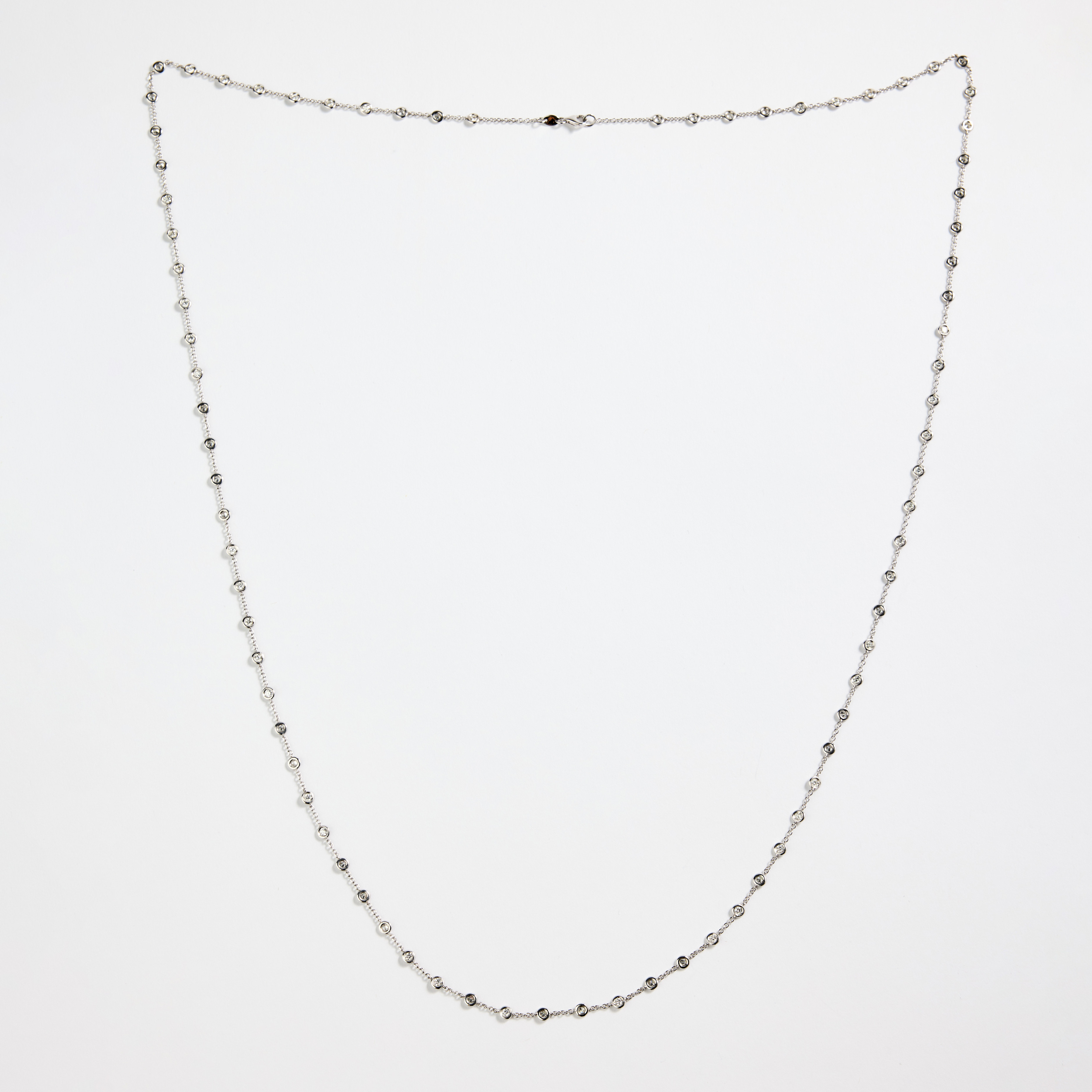 COLLIER, 18K vitguld med diamanter.
