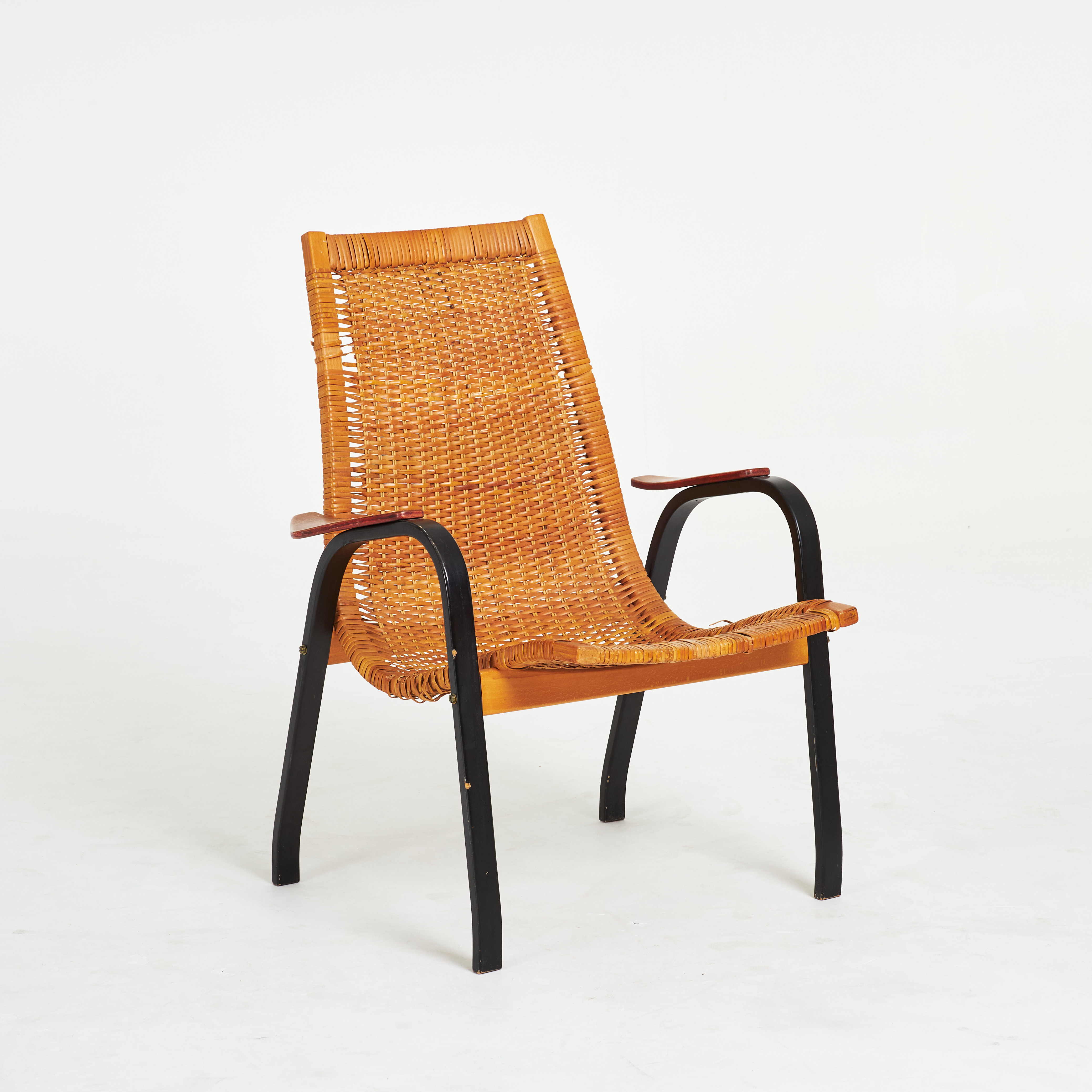 YNGVE EKSTRÖM. Fåtölj, rotting, svärtade ben, brännmärkt, ESE Möbler, 1950/60-tal.