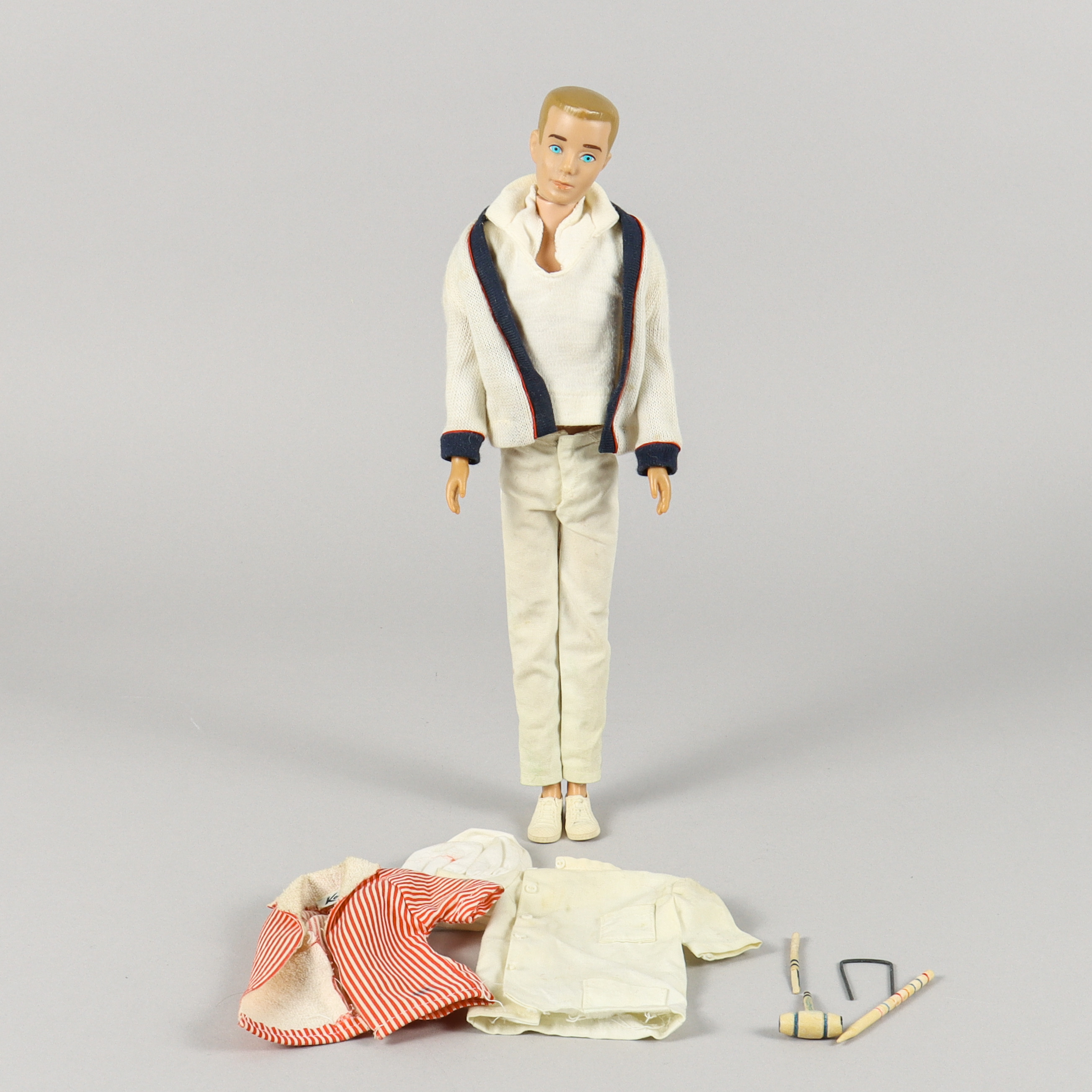 BARBIE, #750 Ken Blond, © 1960 by Mattel, Inc. Hawthorne Calif. U.S.A. (1961-1963).