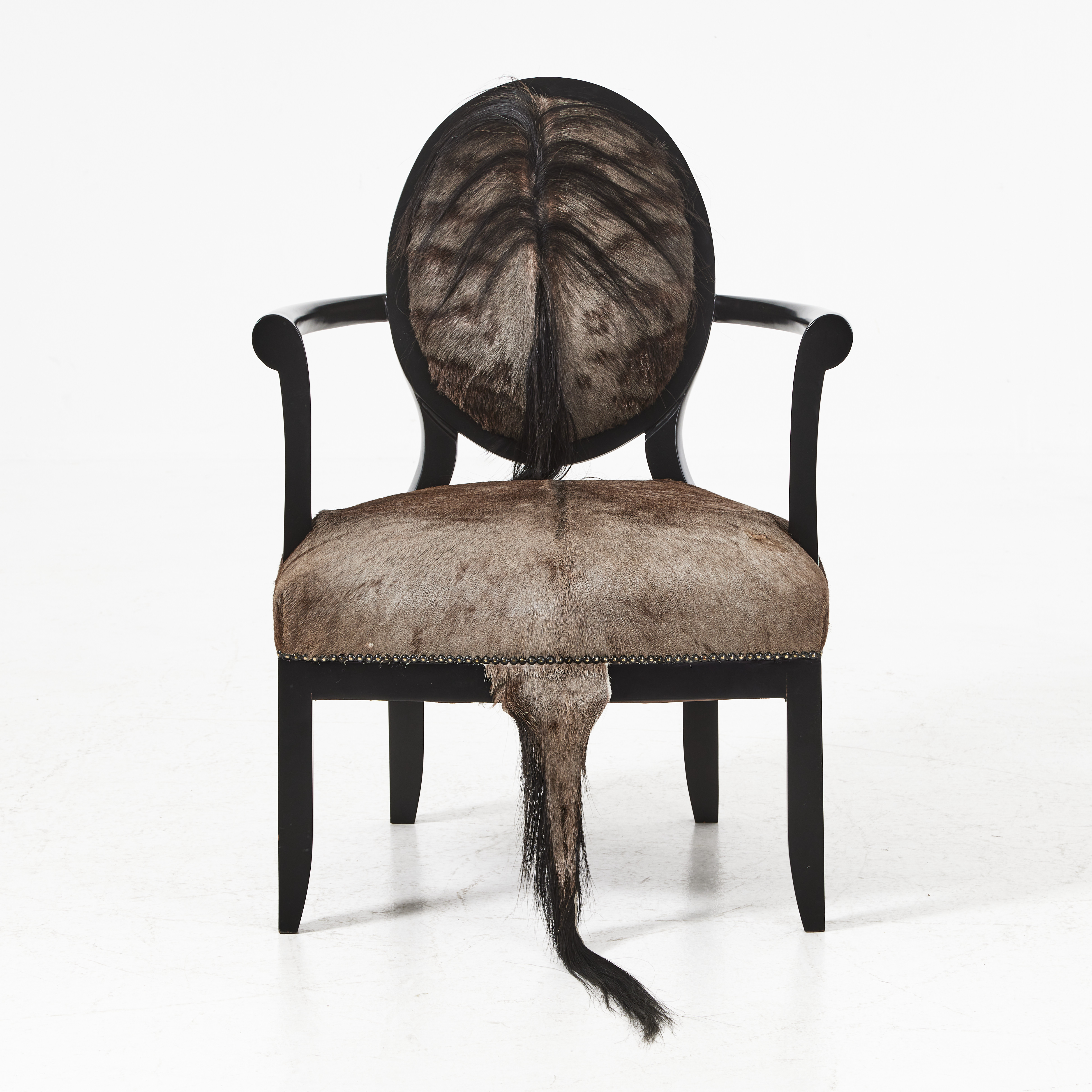 KARMSTOL, "Wildebeest Hide Manhattan Chair", Ngala Trading, Sydafrika.