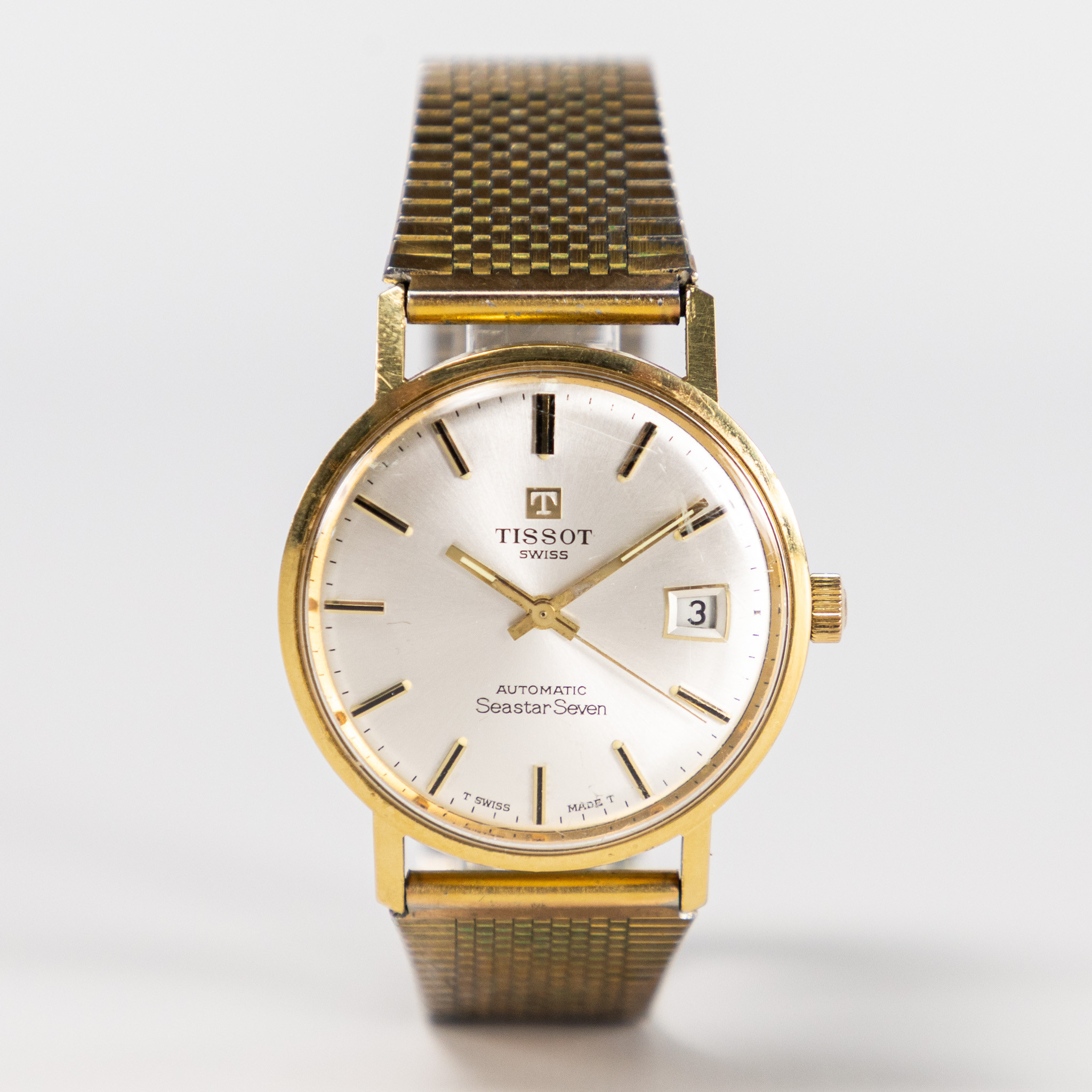 TISSOT. Seastar Seven Automatic, 34 mm, 18k guld.