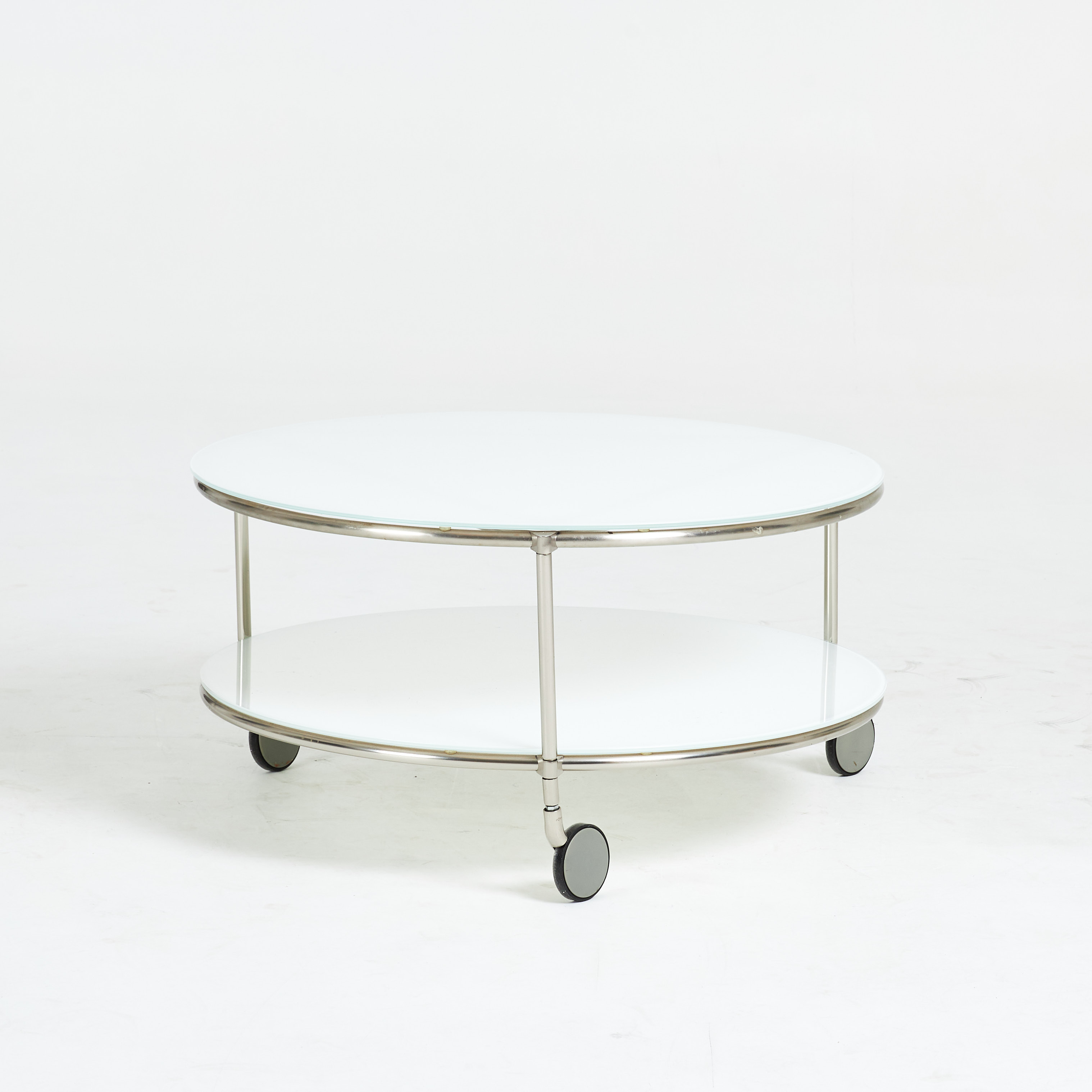 EHLEN JOHANSSON. Soffbord. "Strind", IKEA, glas och kromad metall, på hjul.