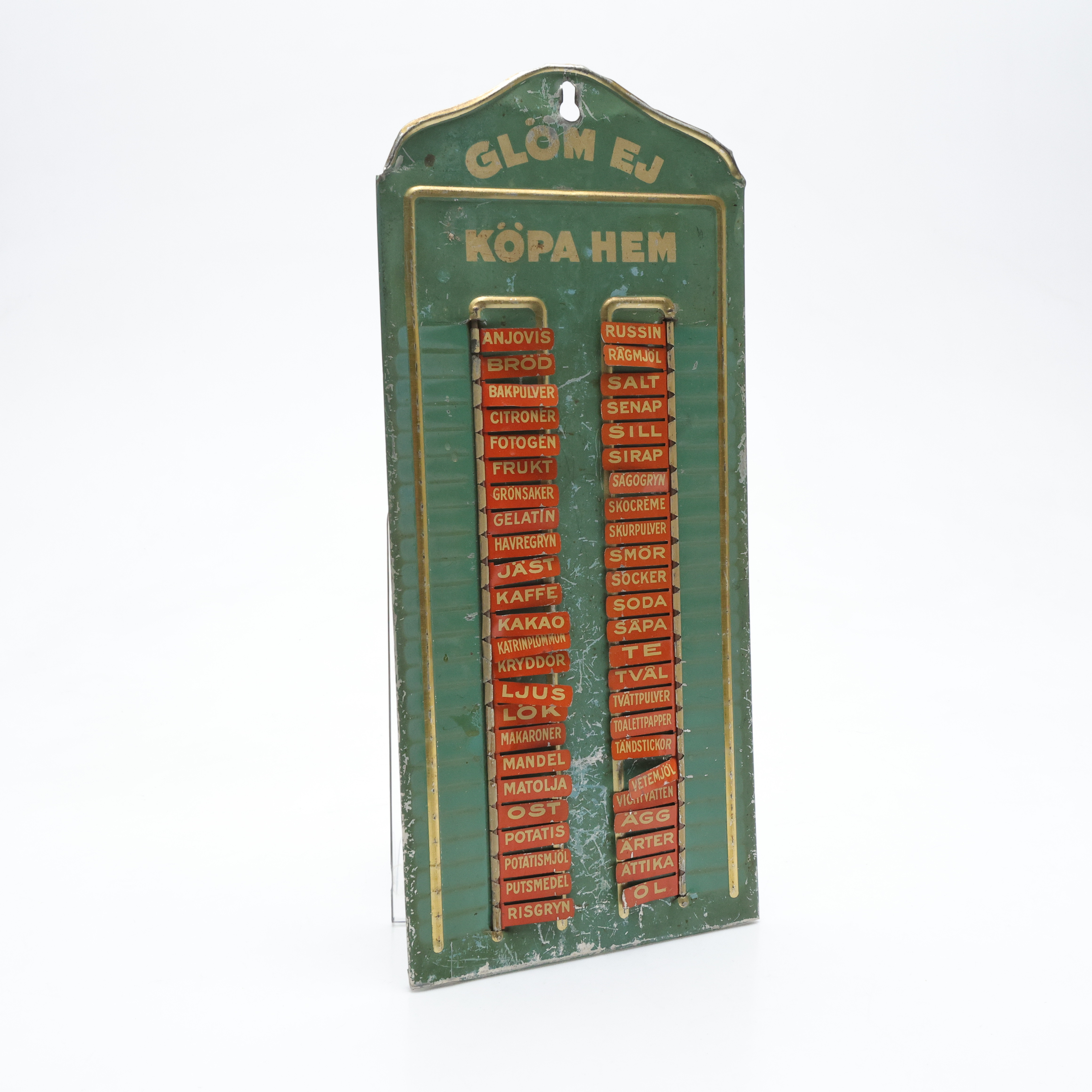Inköpslista, plåt, "Glöm ej köpa hem", omkring 1900-talets mitt.