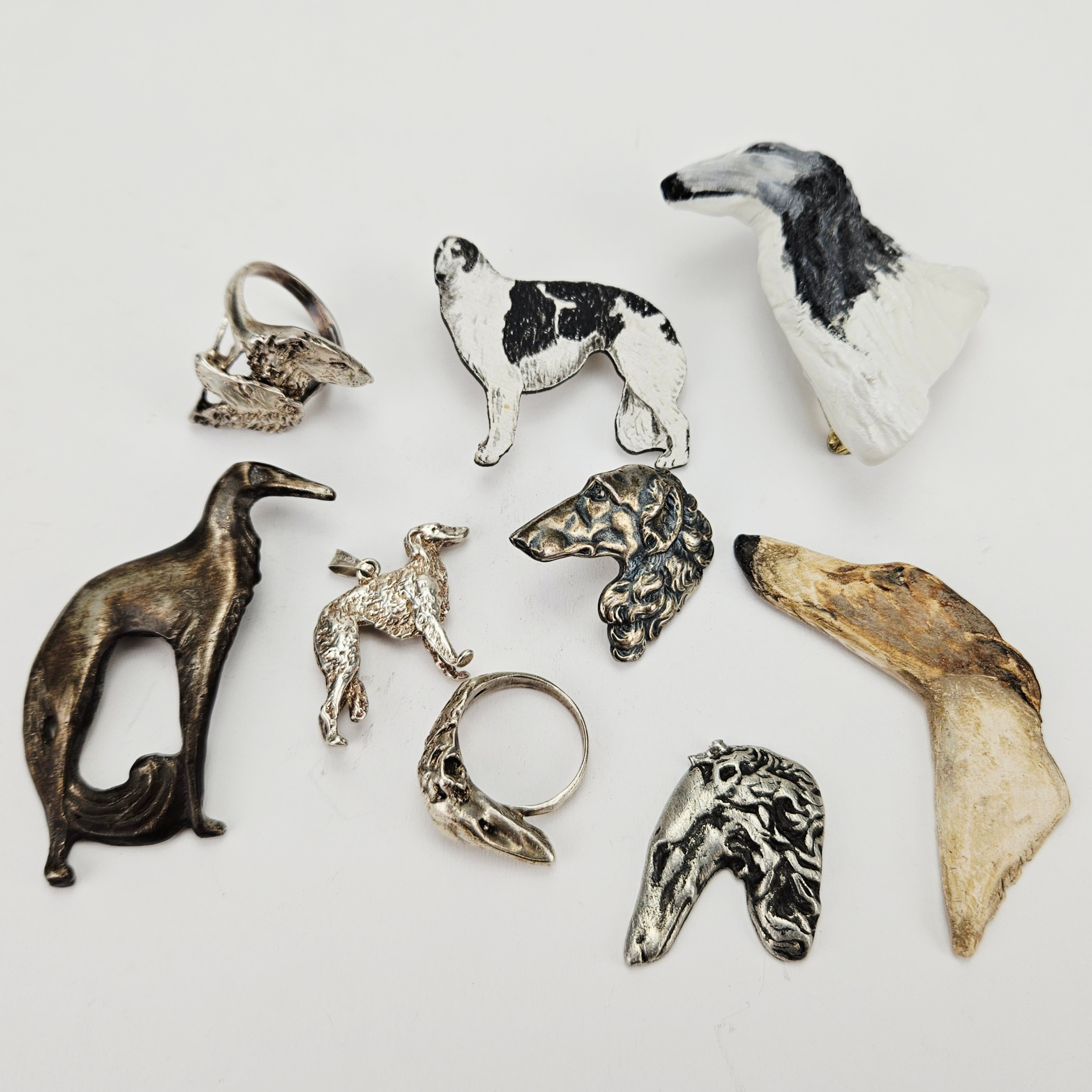 SMYCKEN, 9 st, Borzoi, bland annat silver.