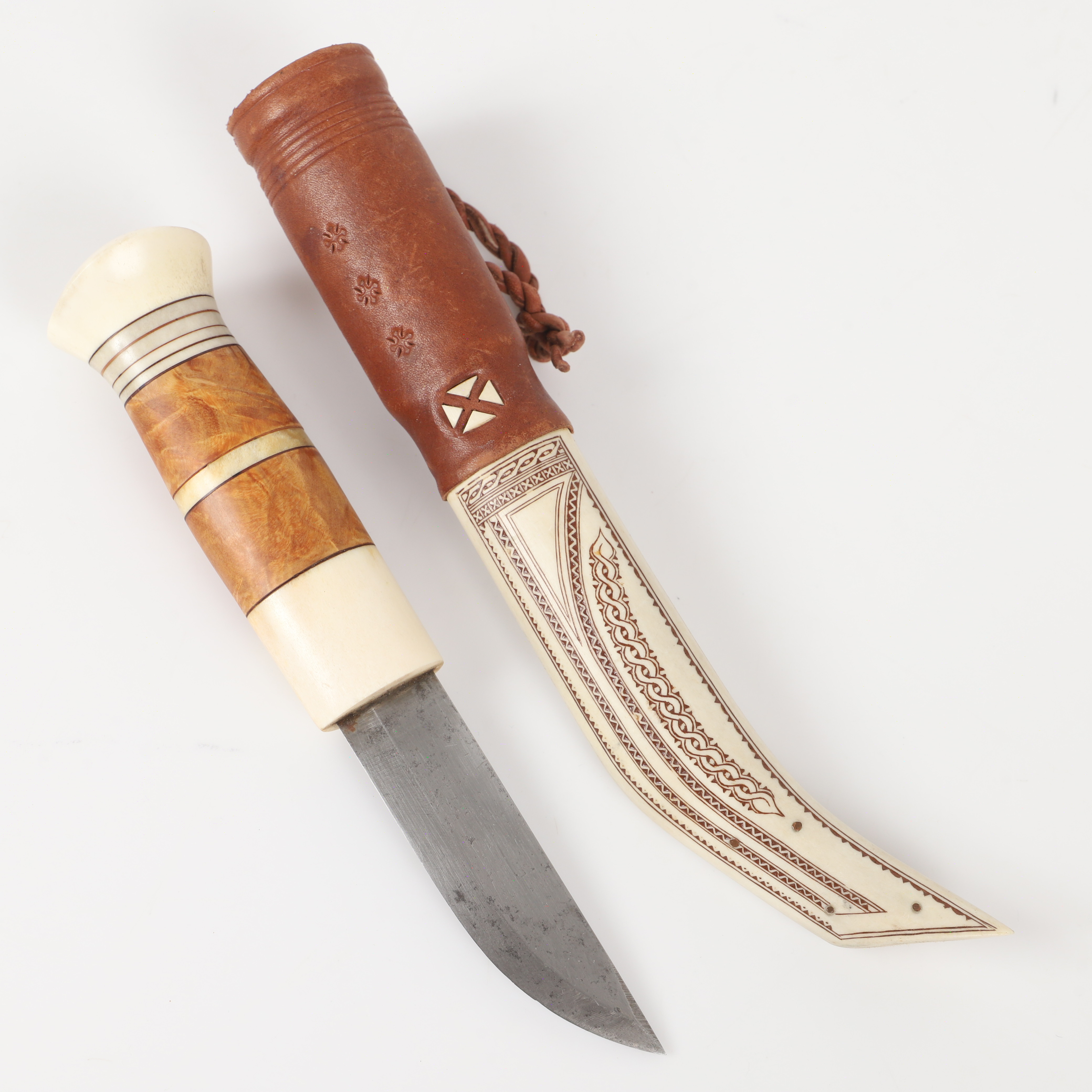 LENNART SAMMELIN. Kniv, renhorn och skinn, samearbete, signerad.