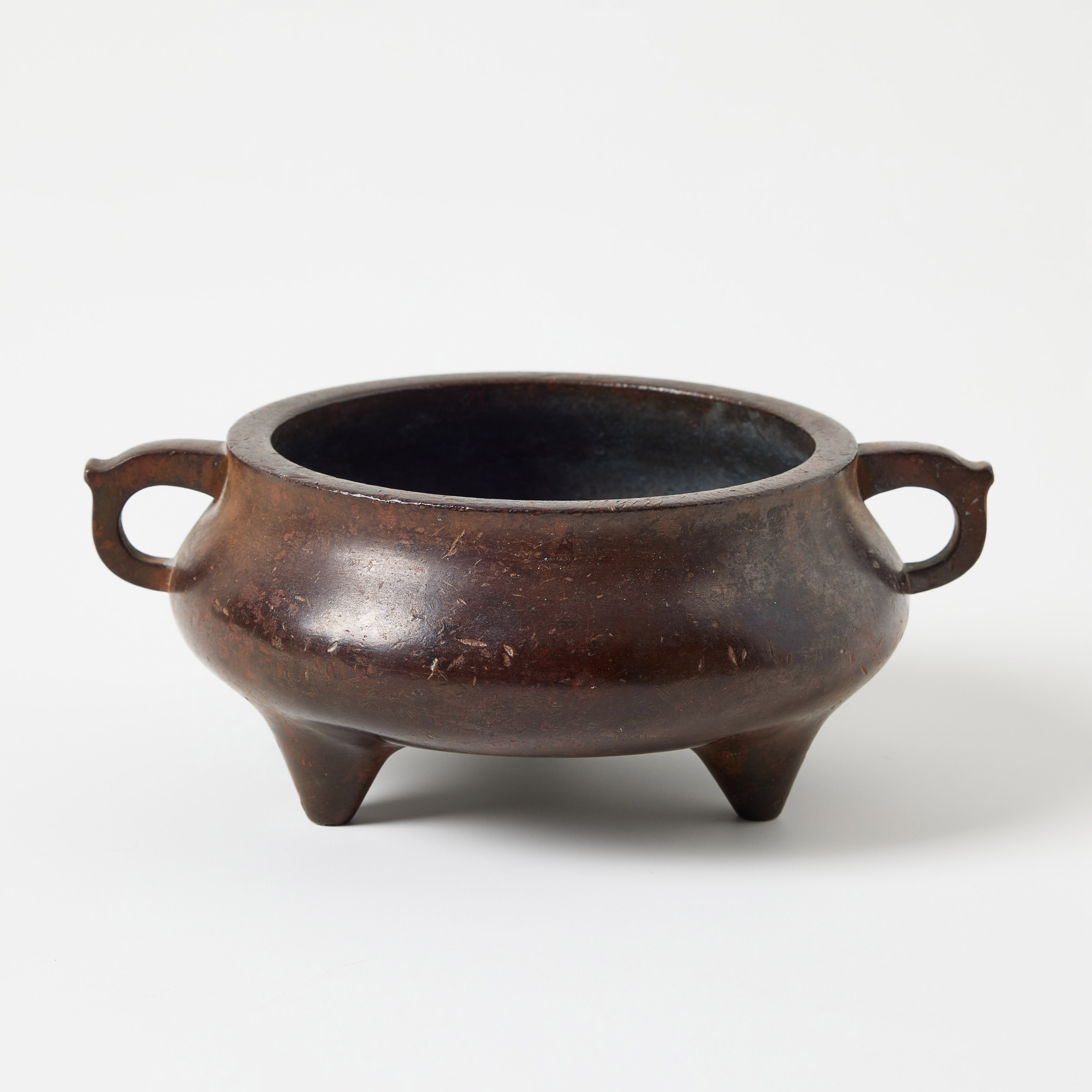 A Chinese Bronze Tripod Censer.