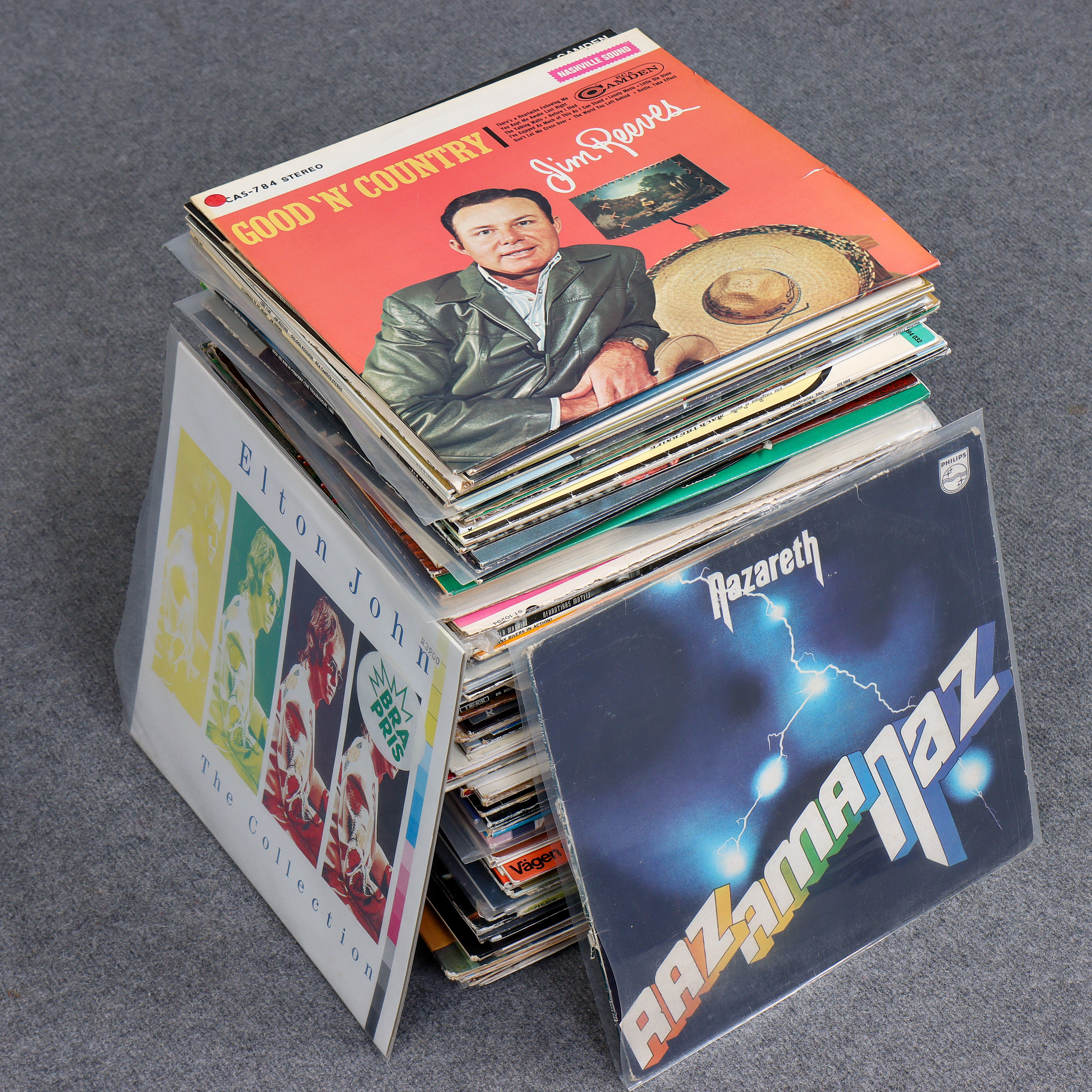 ÖVER 120 LP-SKIVOR, NAZARETH, ELO, YNGWIE MALMSTEEN, FOLKLÅR BENGT SÄNDH & FINN ZETTERHOLM, ELVIS PRESLEY, JIM REEVES, GYLLENE TIDER, JOHNNY CASH, BRYAN ADAMS M.M.