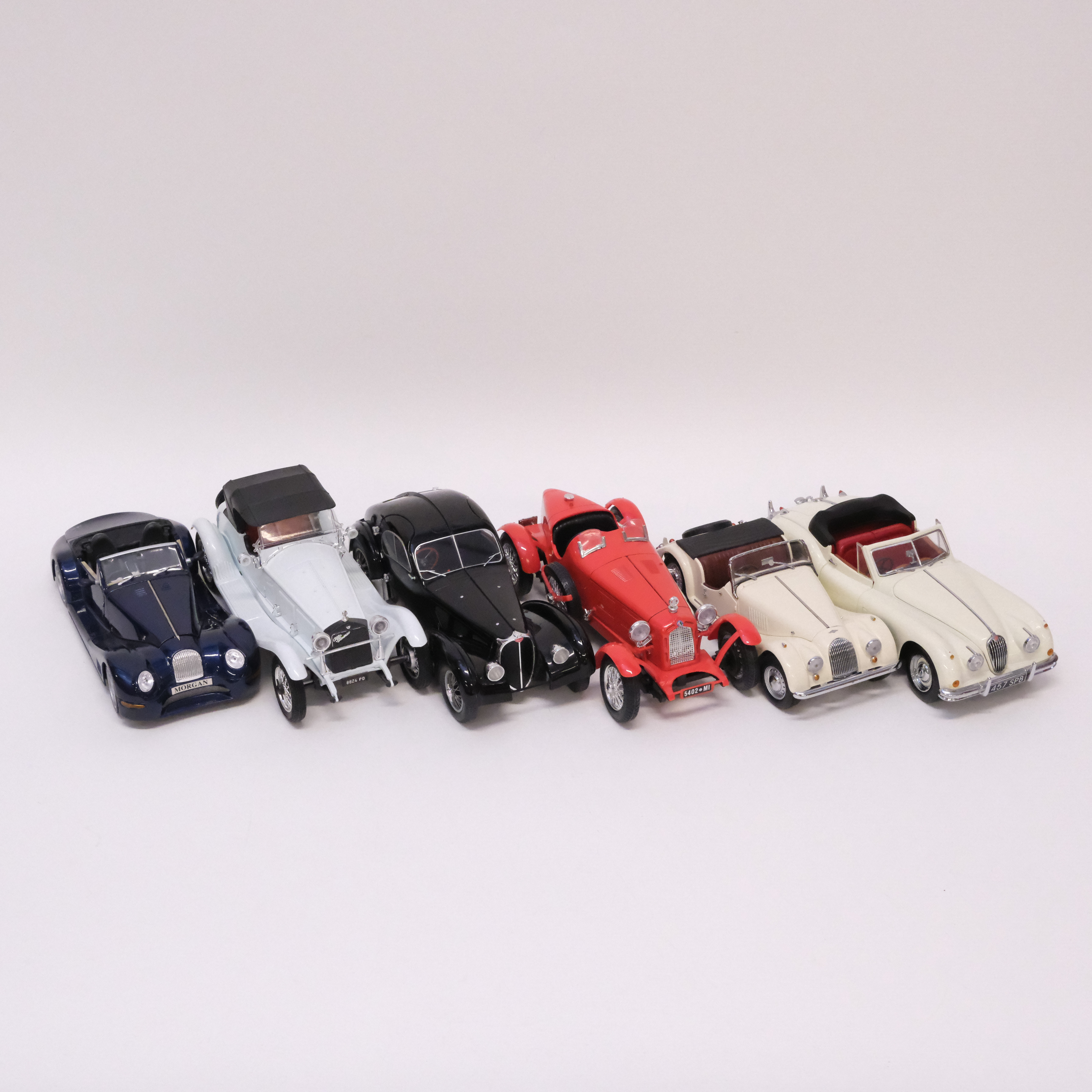 SEX MODELLBILAR. POLISTIL/TONKA, SOLIDO, KYOSHO, BBURAGO, MAISTO OCH SUN STAR. SKALA 1:18.