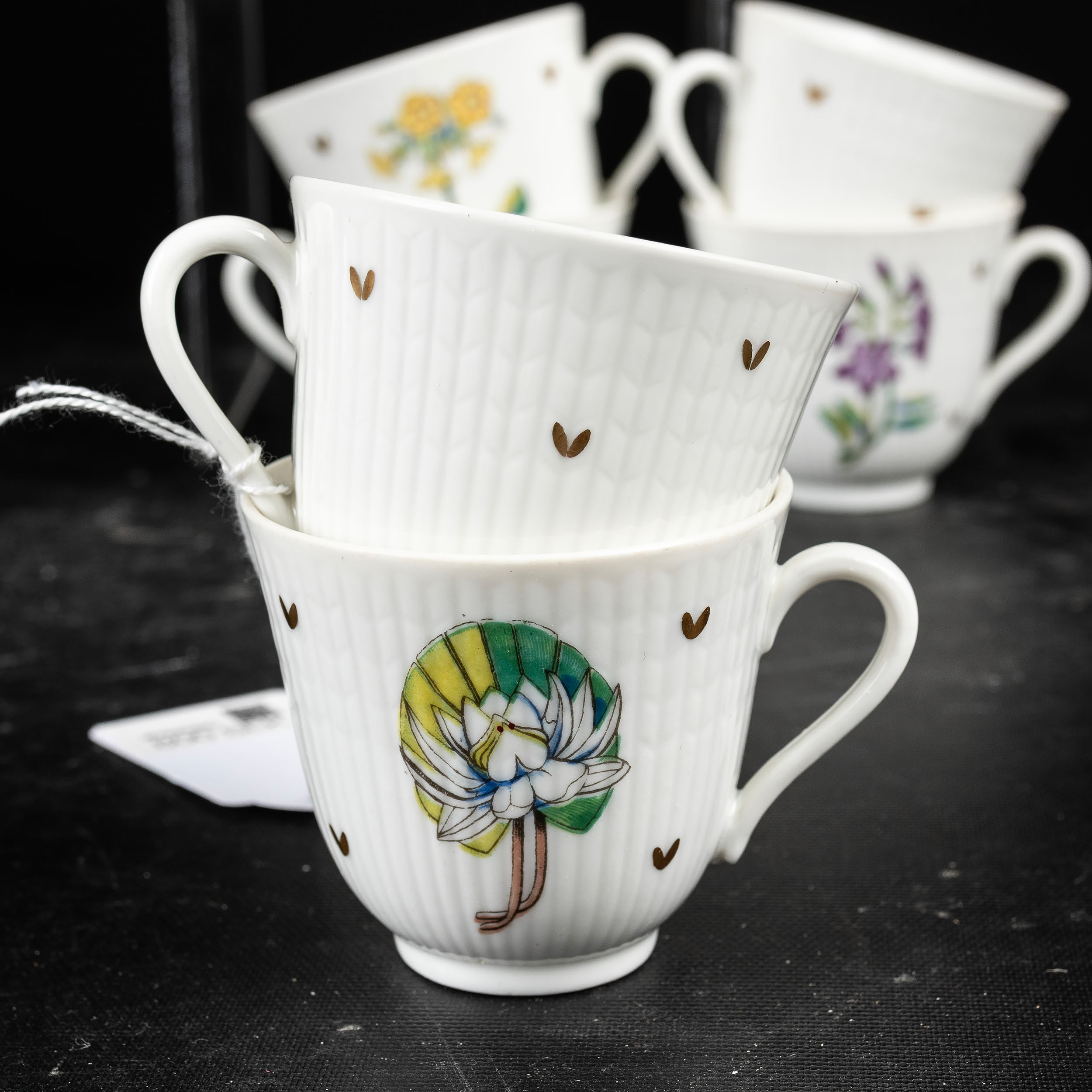 LOUISE ADELBORG. moccakoppar med fat, 20 delar, "Swedish grace" med landskapsblommor, Rörstrand.