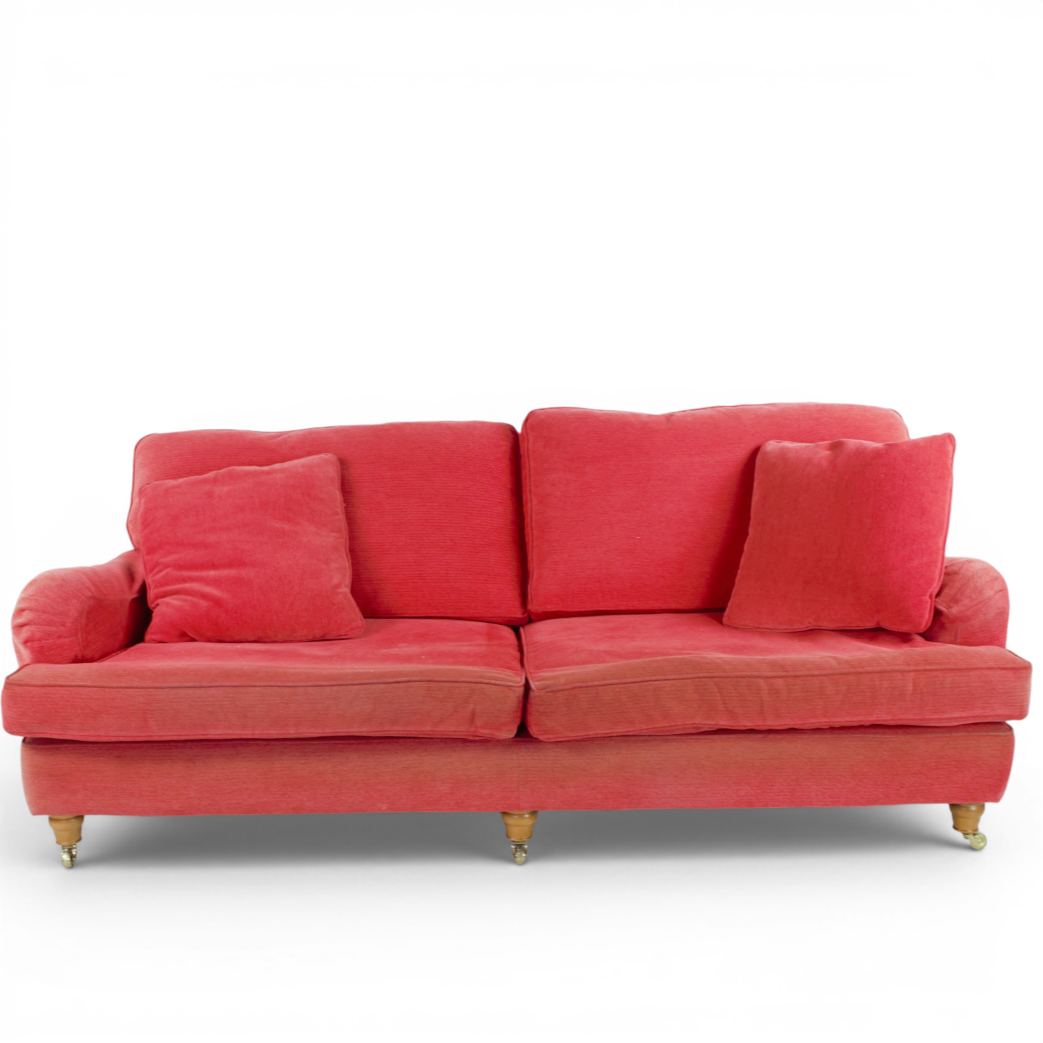 SOFFA, 3-sits, Howardmodell, röd tygklädsel, lös fjäderstoppad rygg- & sittkudde, hjultrissor fram, 2000-tal.