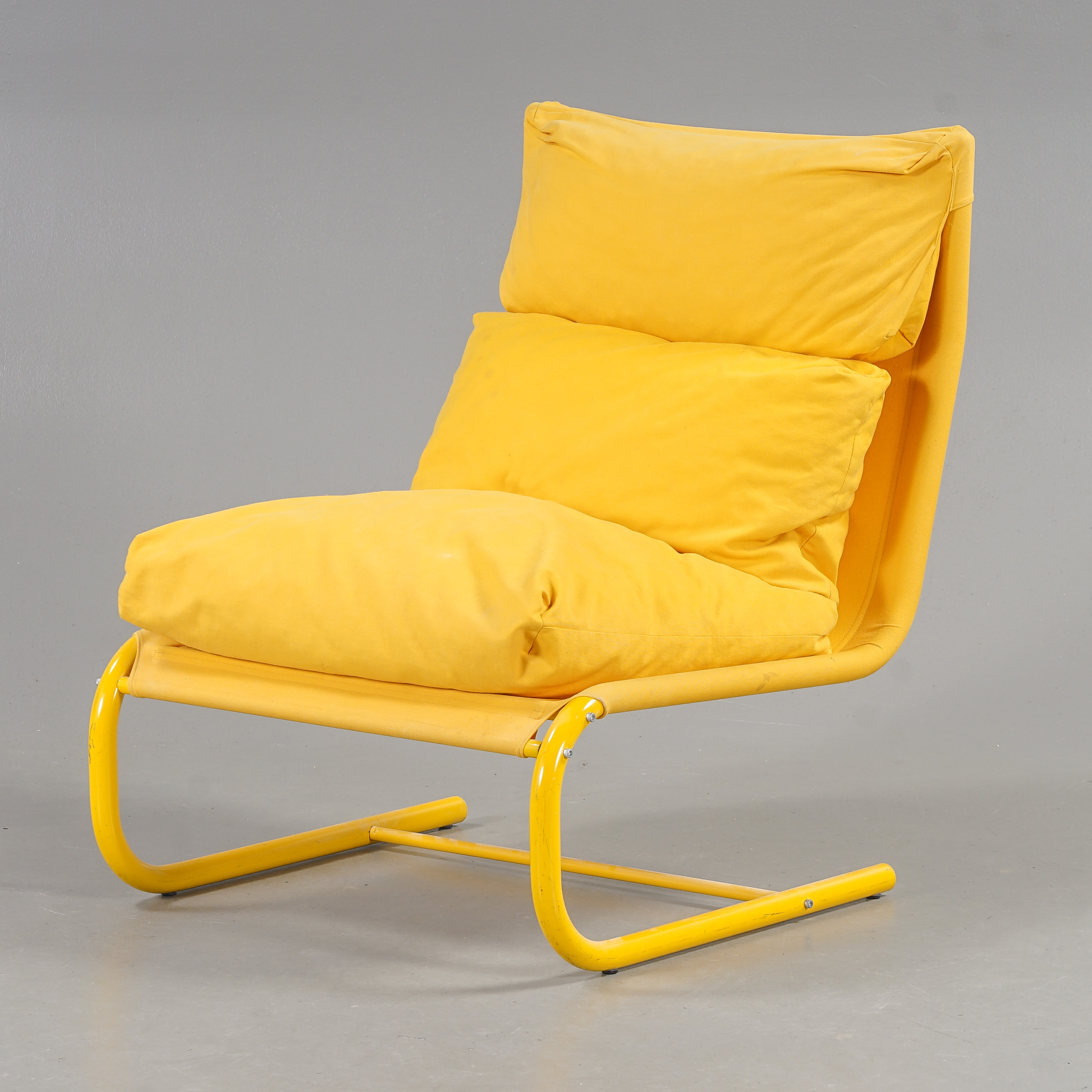 JAN DRANGER & JOHAN HULDT. Fåtölj "Stuns" Stålrör, gul textilklädsel, Ikea, 1970-tal.