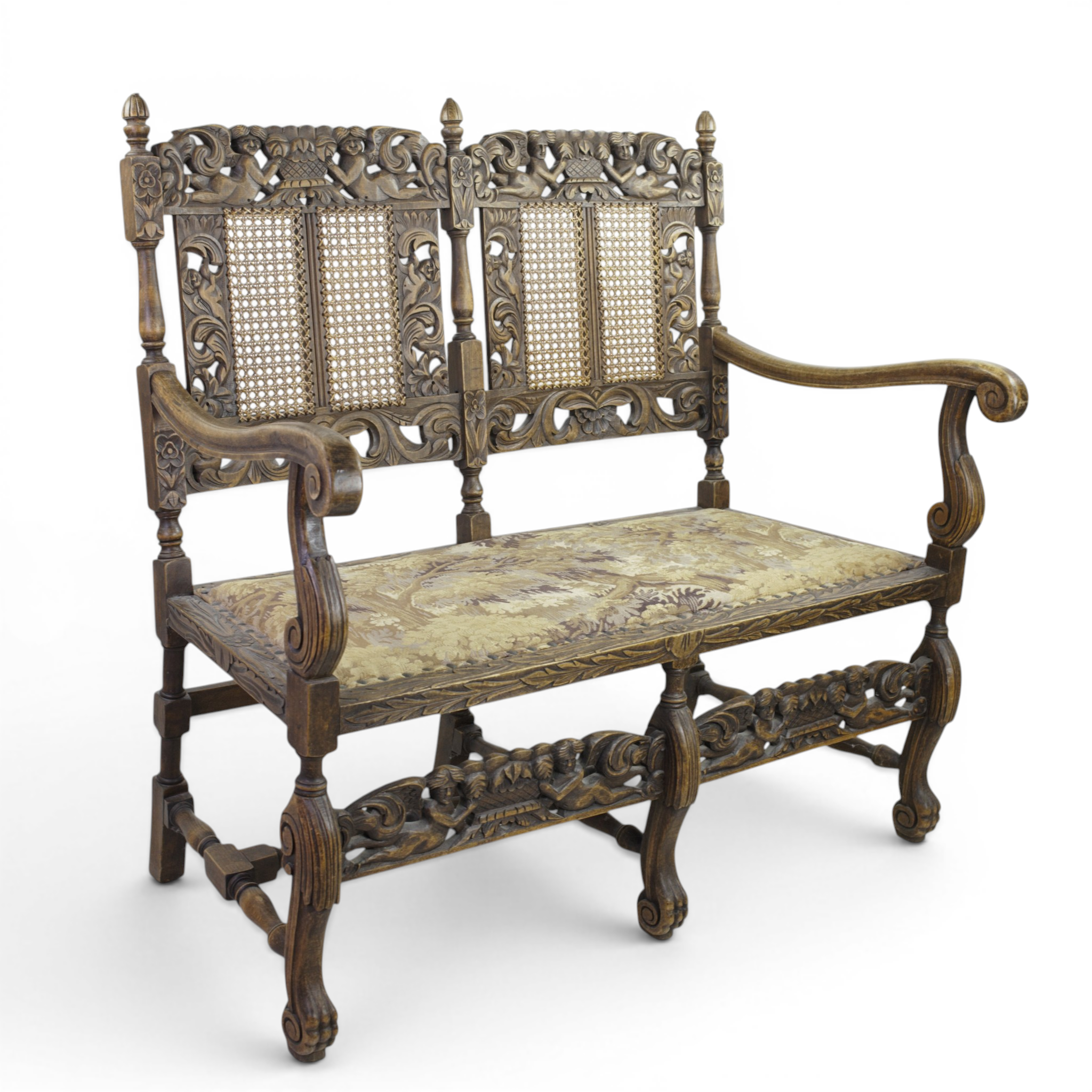 SOFFA, barockstil, skuren ek med bl.a. keruber, ryggbricka delvis med rotting, sits klädd med jacquardvävt tyg, 18/1900-tal.