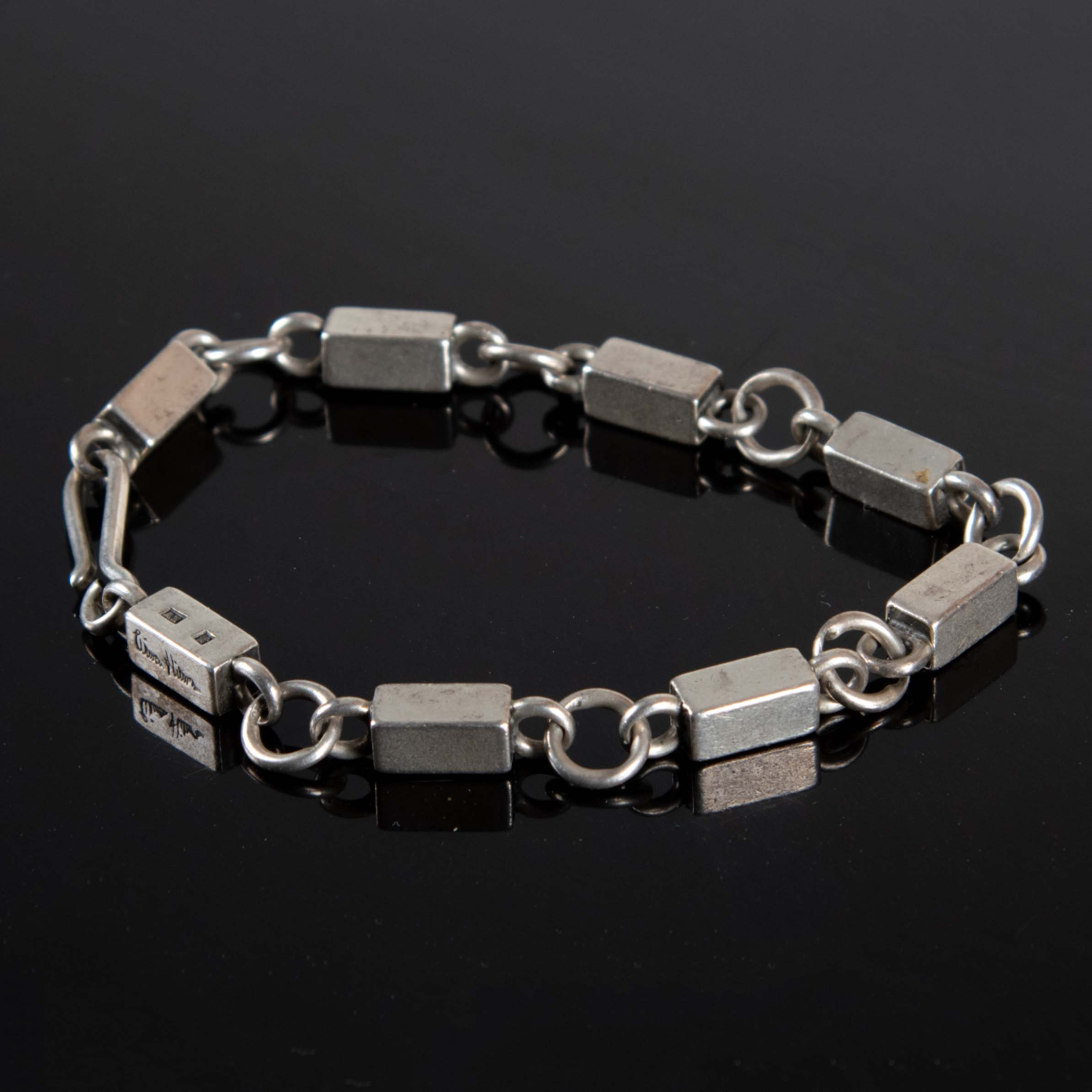 WIWEN NILSSON. Armband, sterlingsilver, stavlänk med mellanliggande ringar, Lund 1965.